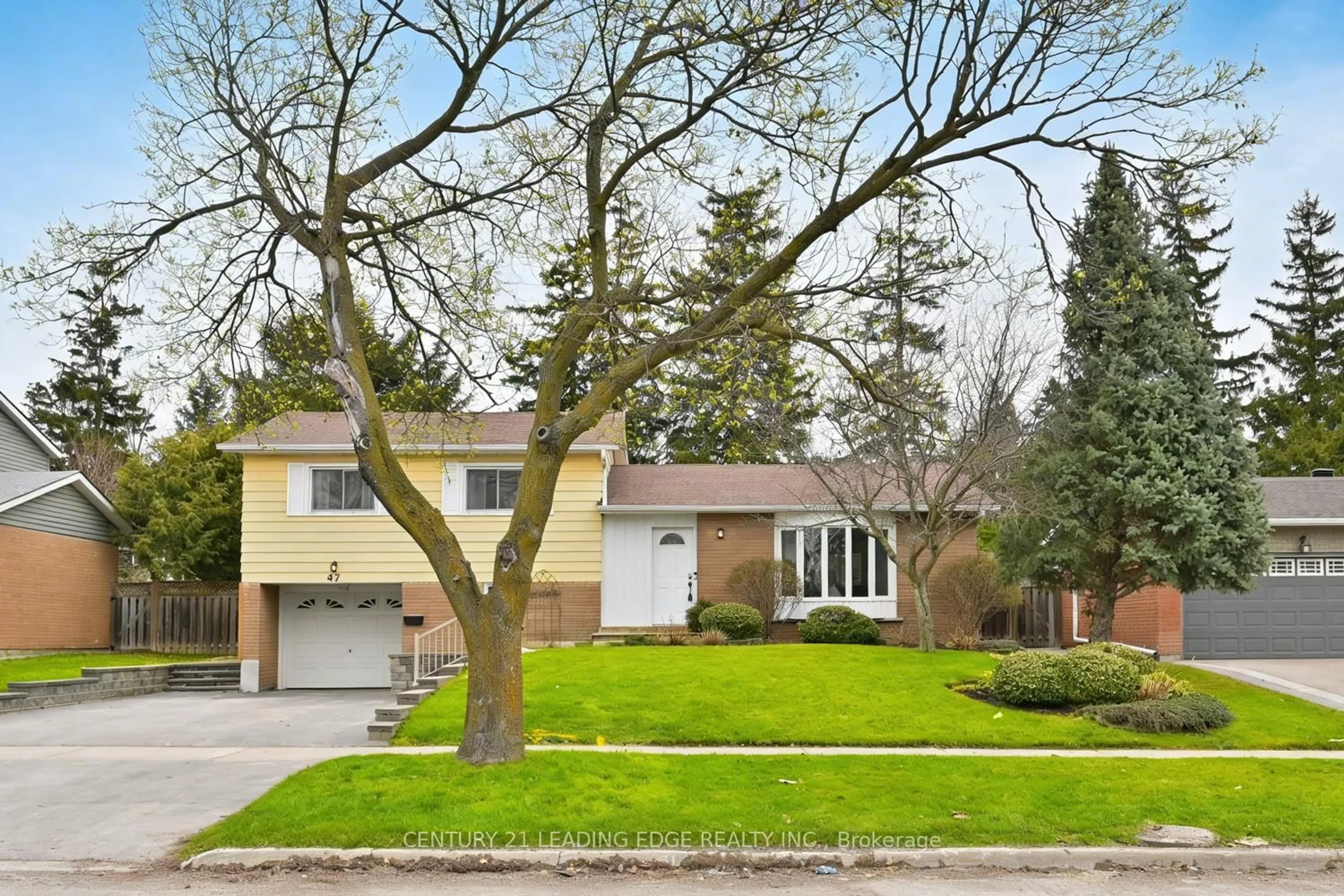 Home with vinyl exterior material, street for 47 Wootten Way, Markham Ontario L3P 2Y3