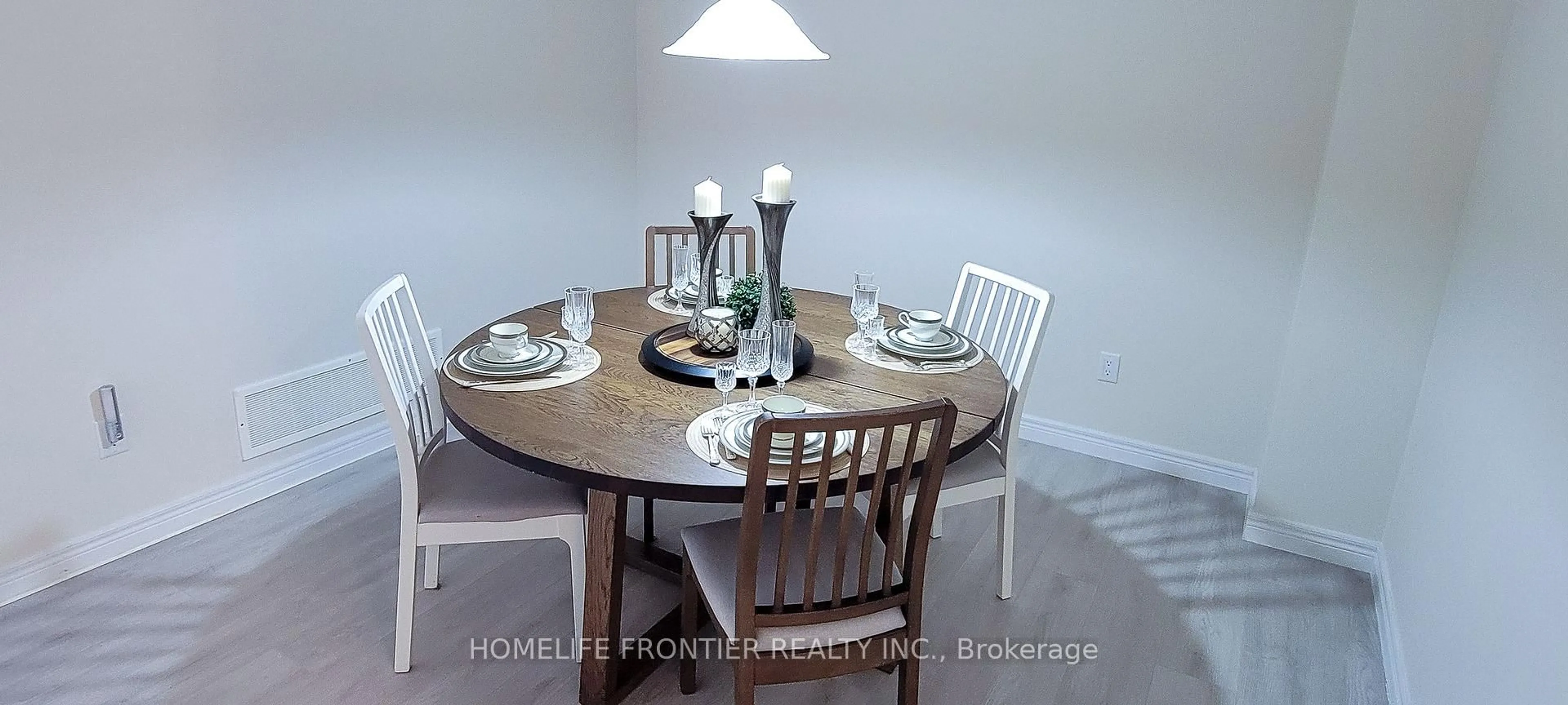 Dining room, wood/laminate floor for 43 Sundragon Tr, Bradford West Gwillimbury Ontario L3Z 0H4