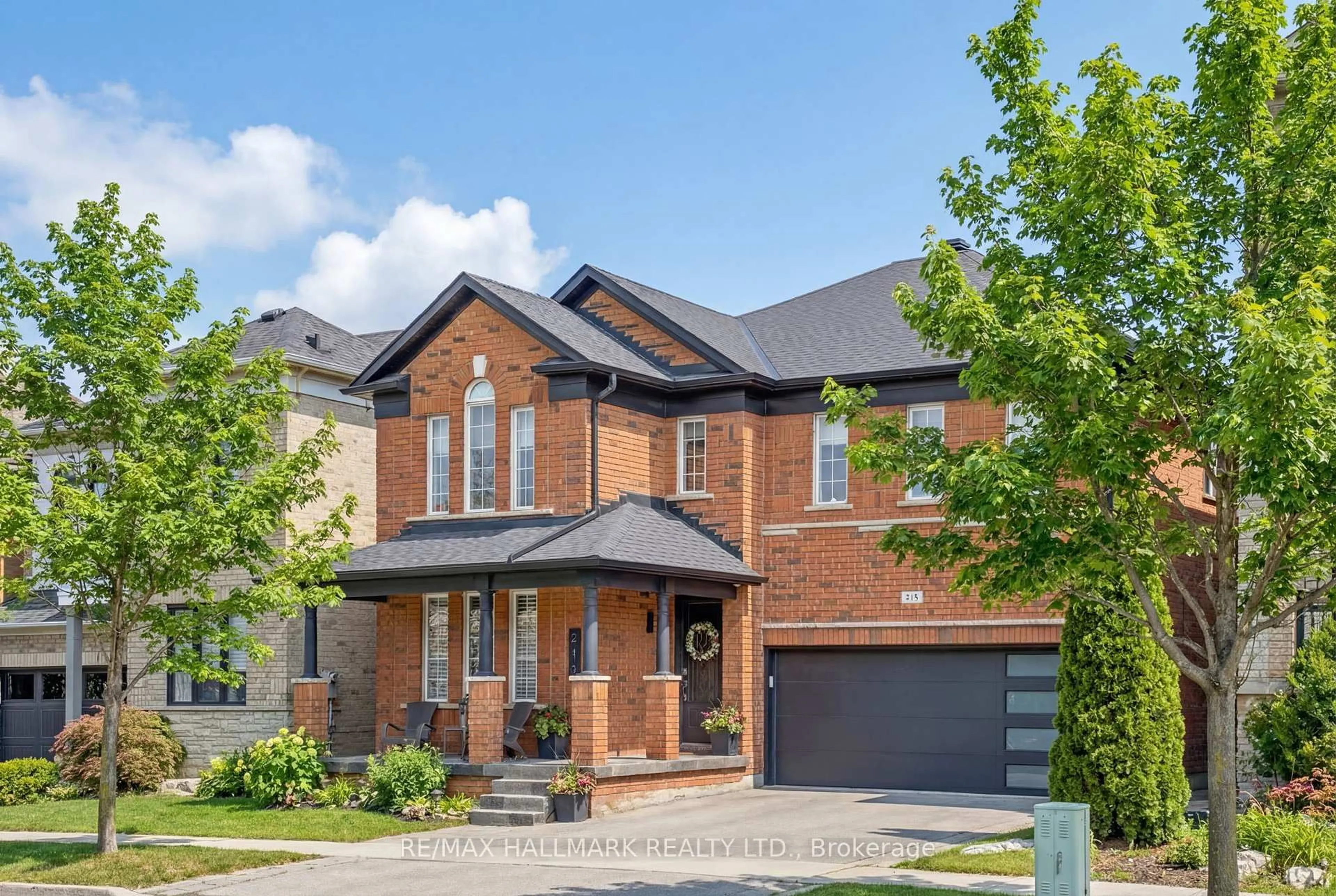 Home with brick exterior material, street for 215 Vellore Woods Blvd, Vaughan Ontario L4H 1Y5