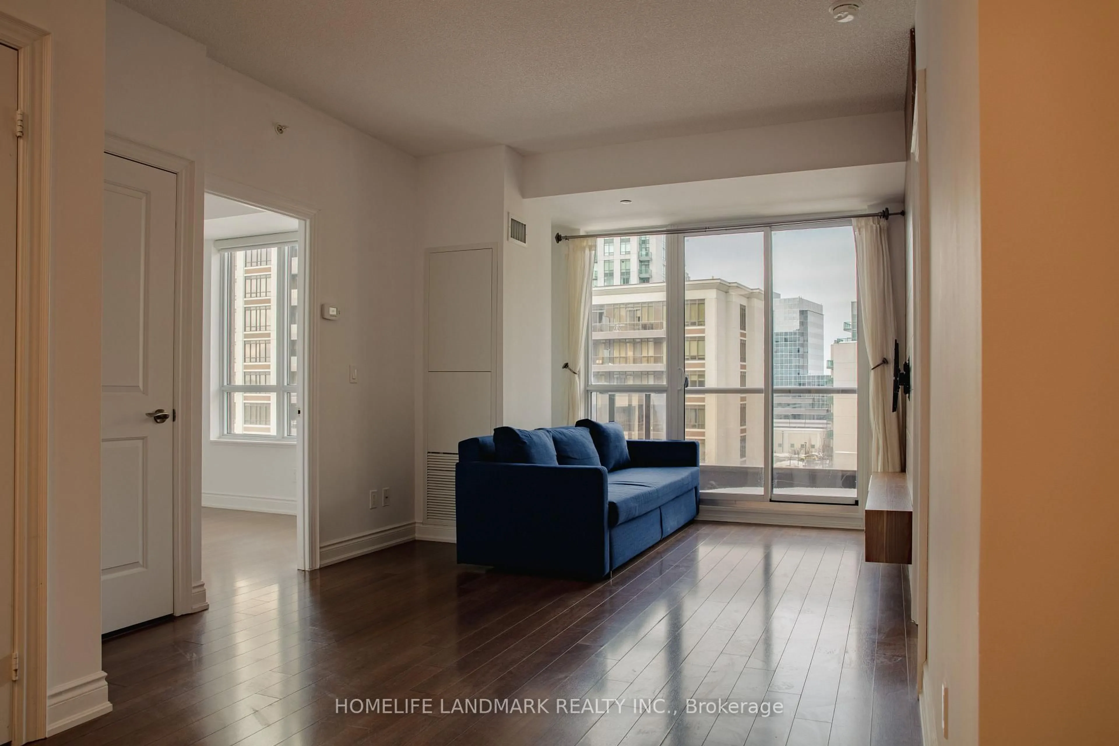 Living room with furniture, unknown for 38 Cedarland Dr #716, Markham Ontario L6G 0G7