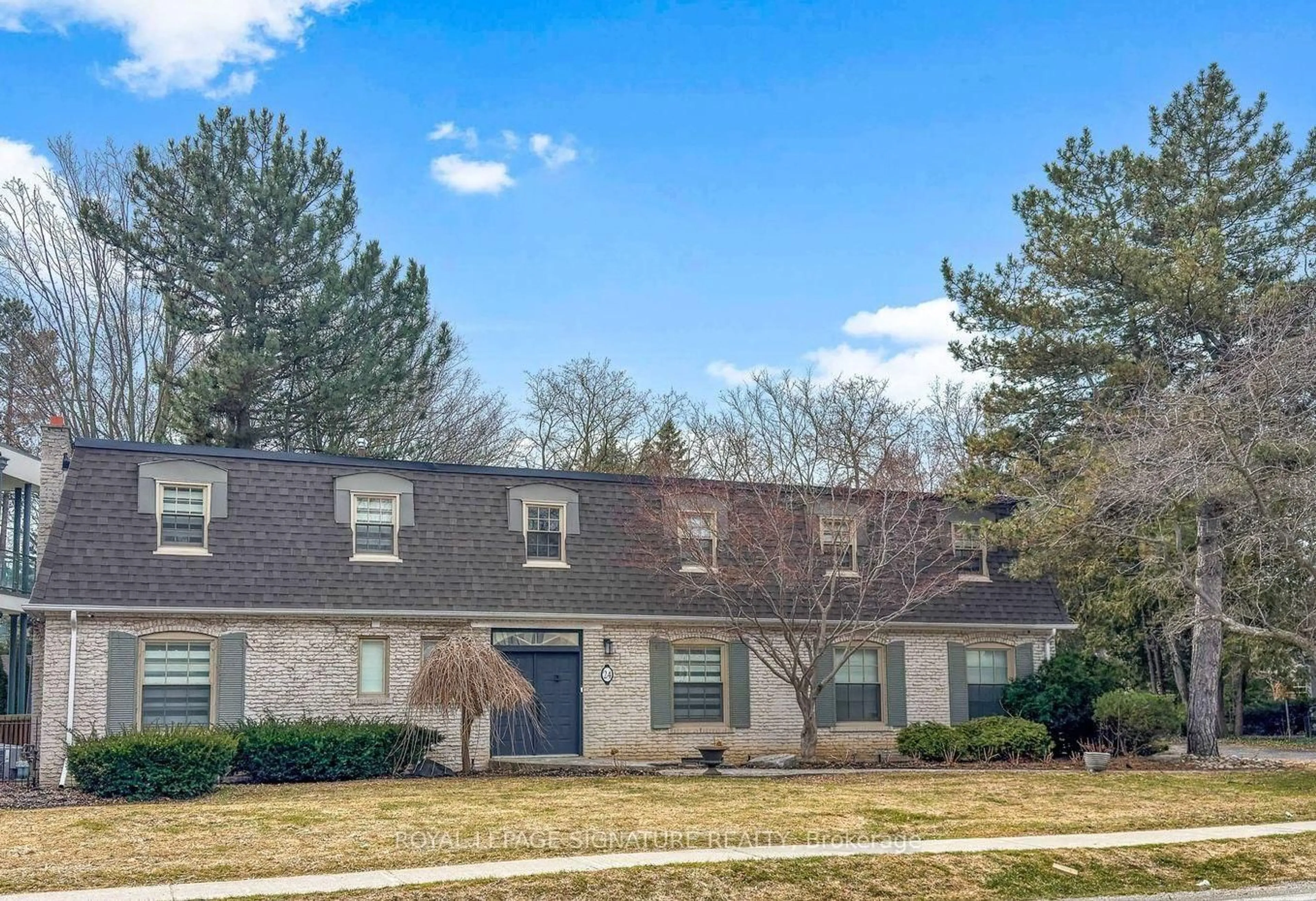 Home with brick exterior material, street for 24 Laureleaf Rd, Markham Ontario L3T 2X5