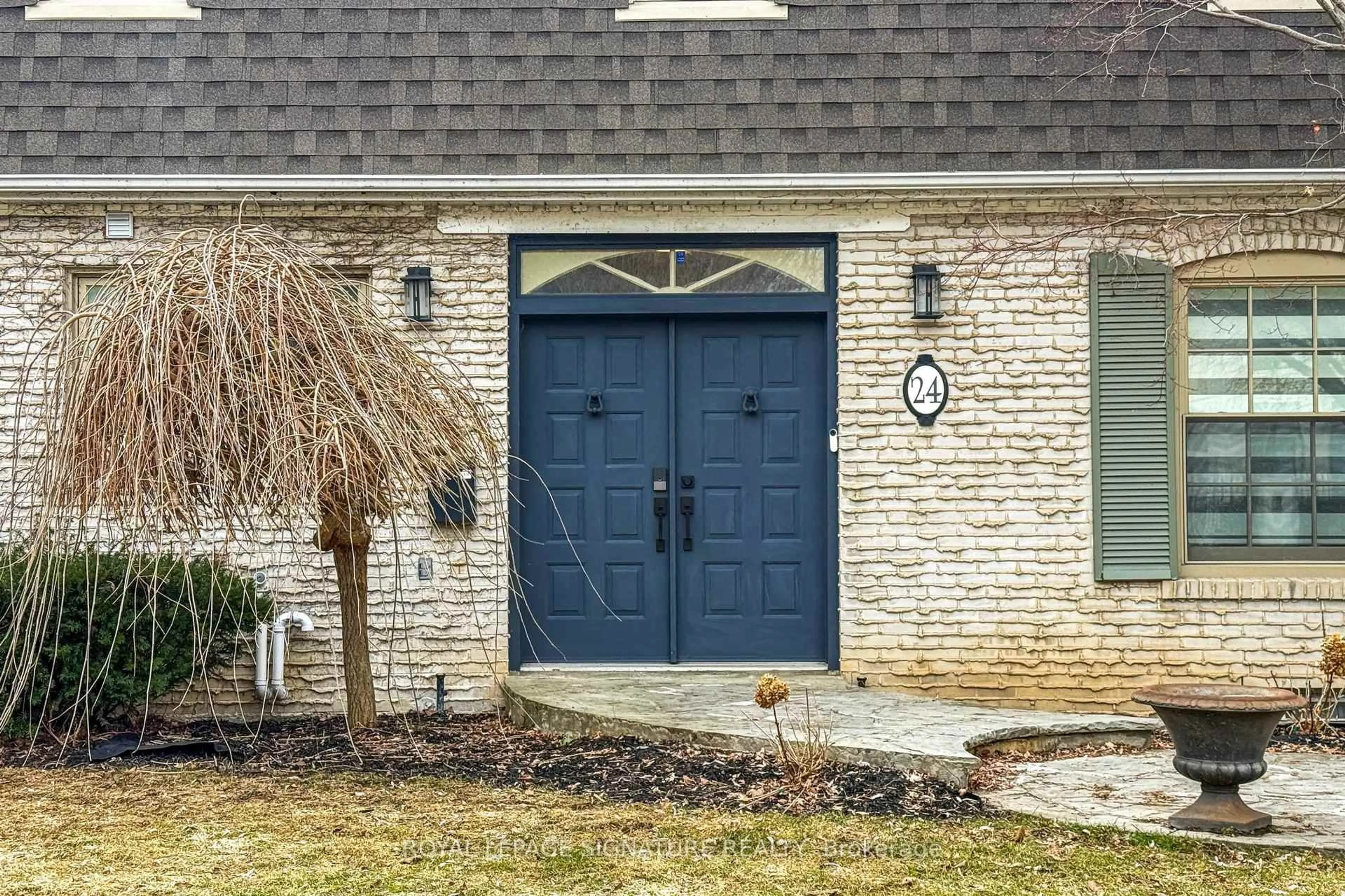 Home with brick exterior material, street for 24 Laureleaf Rd, Markham Ontario L3T 2X5