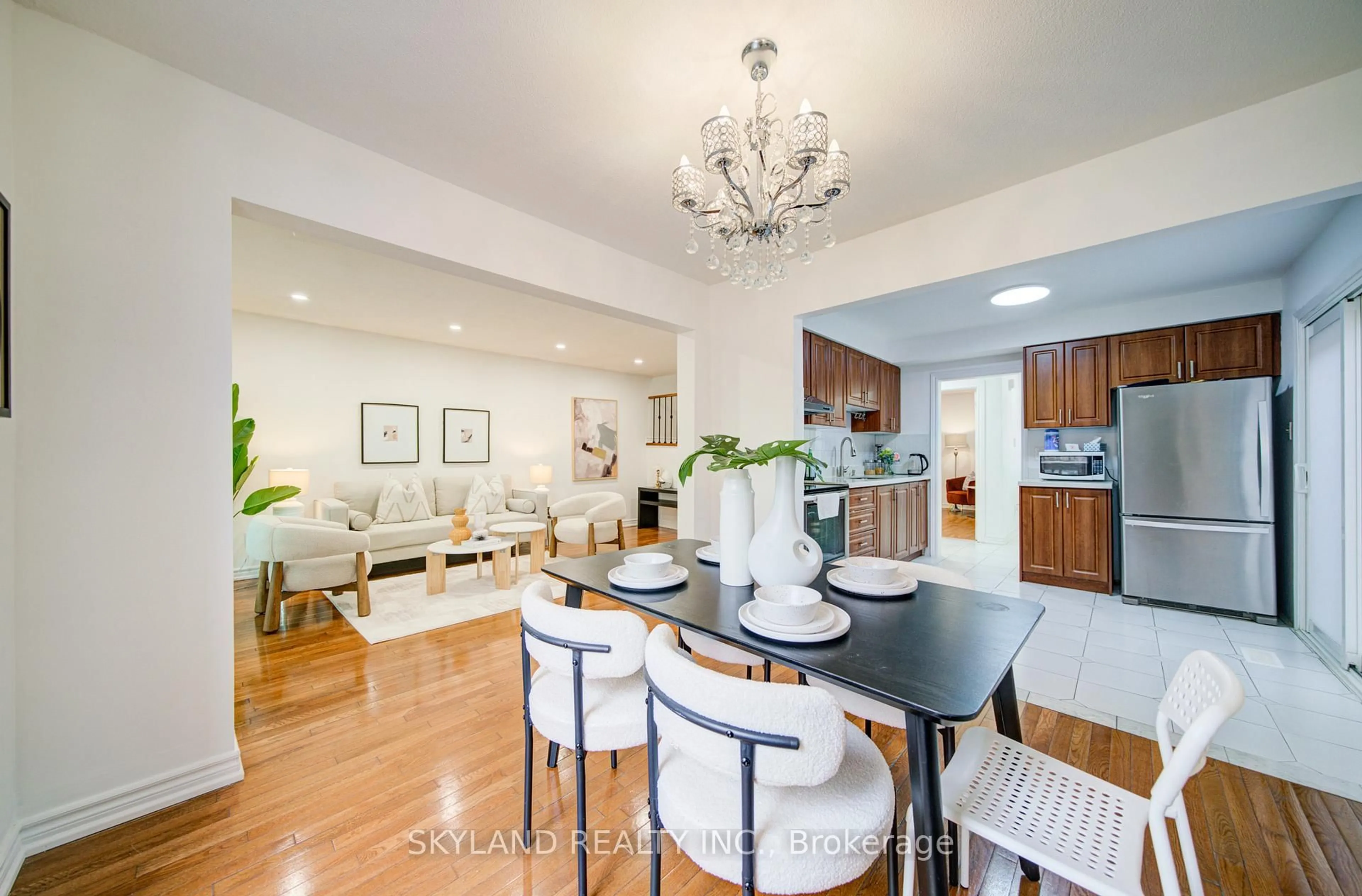 Open concept kitchen, wood/laminate floor for 56 Upton Cres, Markham Ontario L3R 3T4