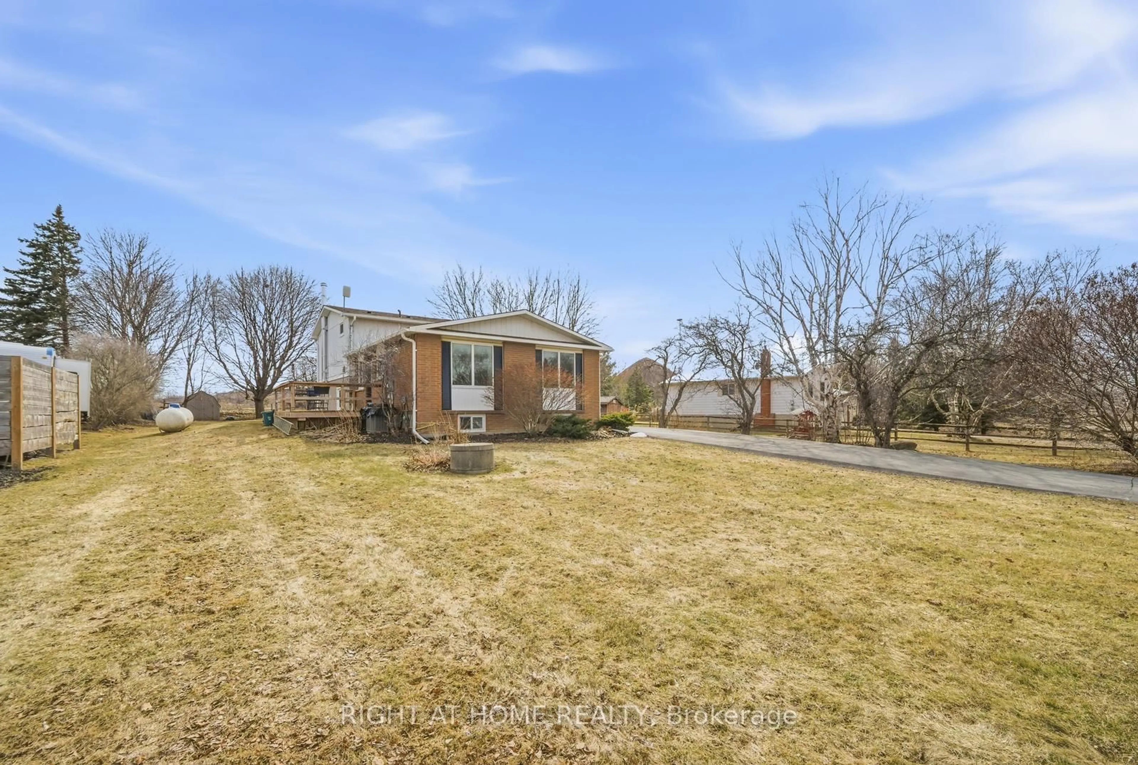 A pic from outside/outdoor area/front of a property/back of a property/a pic from drone, street for 5885 7th Line, New Tecumseth Ontario L0G 1A0