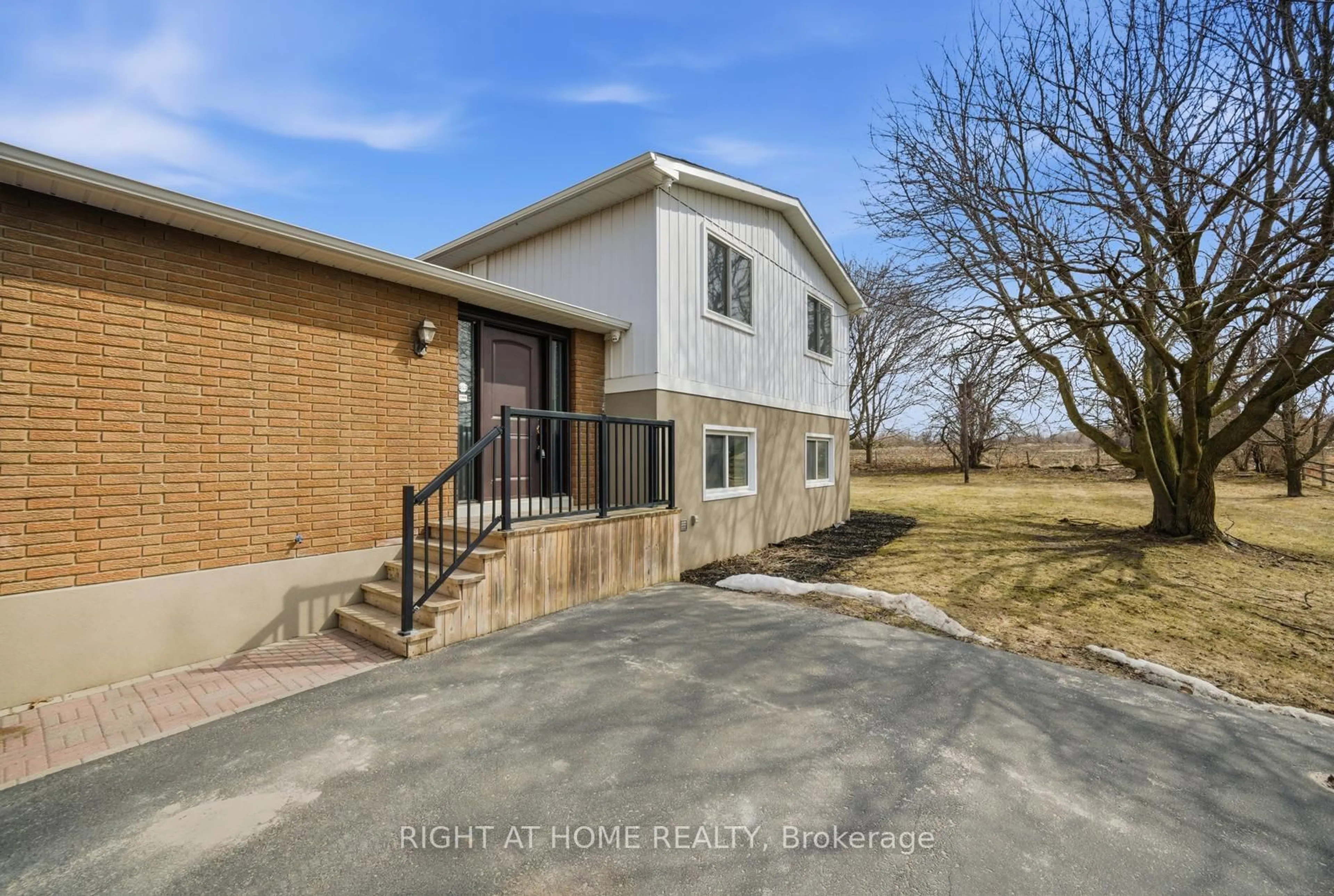 A pic from outside/outdoor area/front of a property/back of a property/a pic from drone, street for 5885 7th Line, New Tecumseth Ontario L0G 1A0