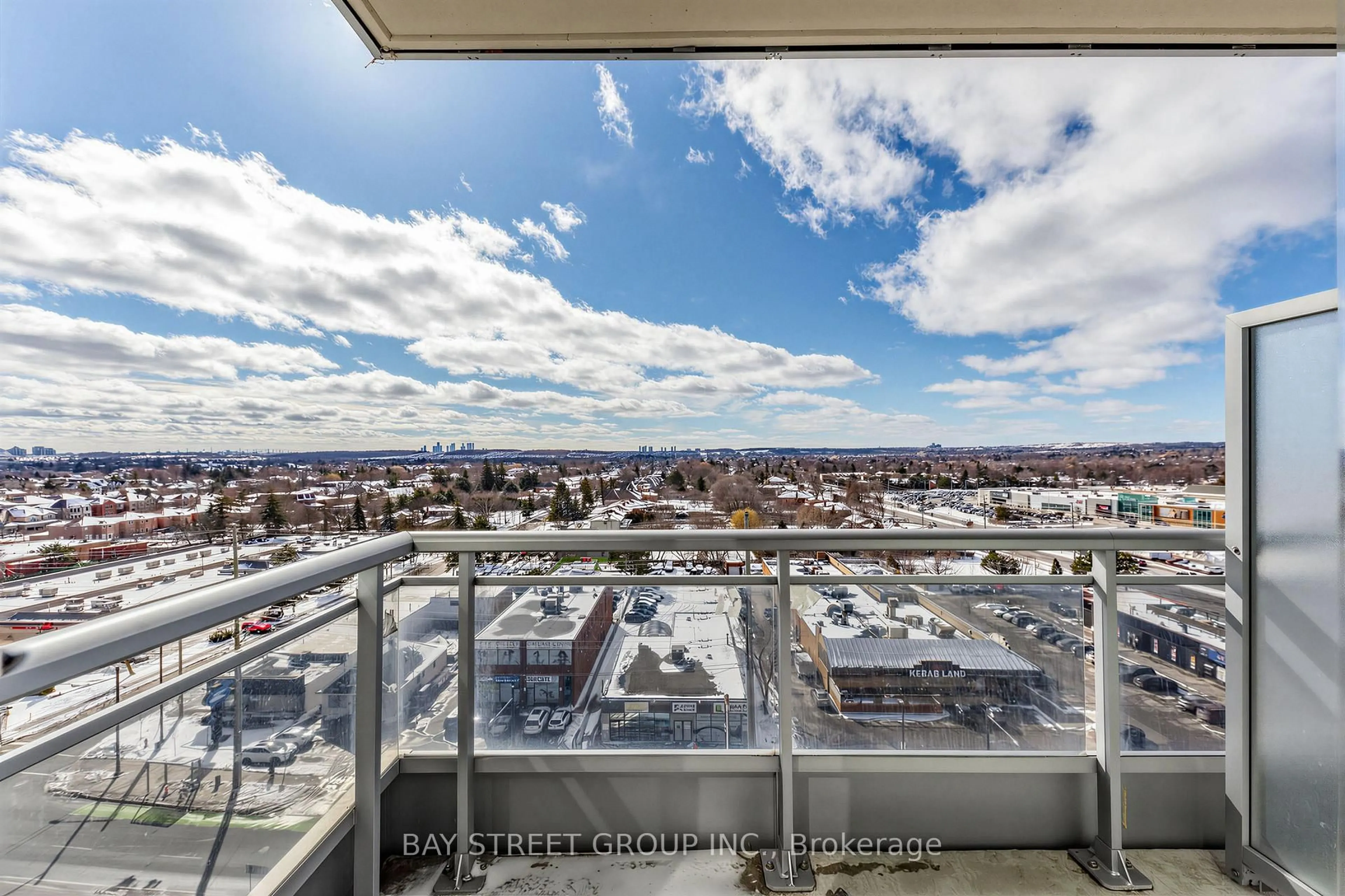 Balcony in the apartment, city buildings view from balcony for 9201 Yonge St #NW1013, Richmond Hill Ontario L4C 1H9
