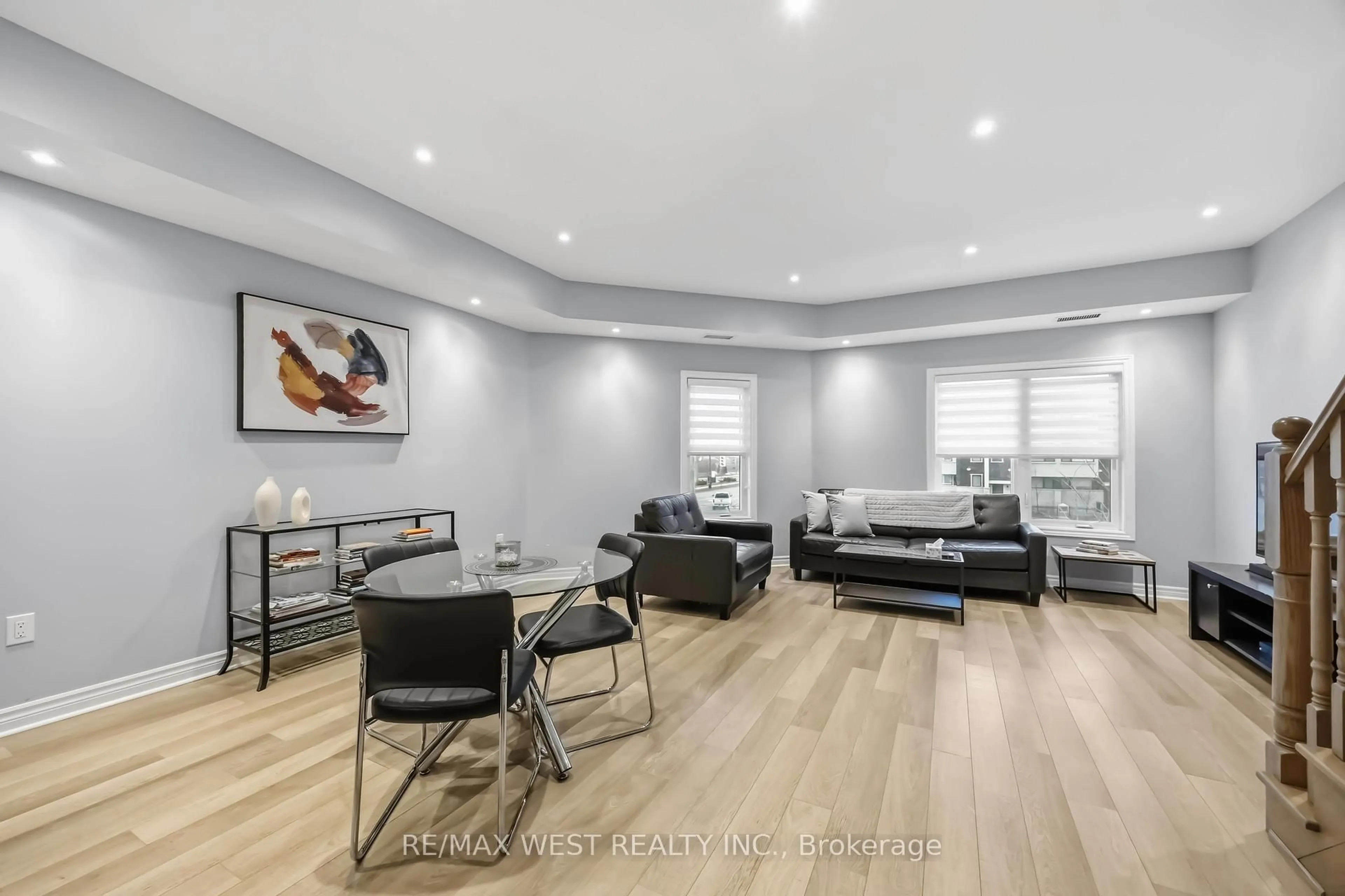 Living room with furniture, wood/laminate floor for 3905 Major MacKenzie Dr #32, Vaughan Ontario L4H 4J9