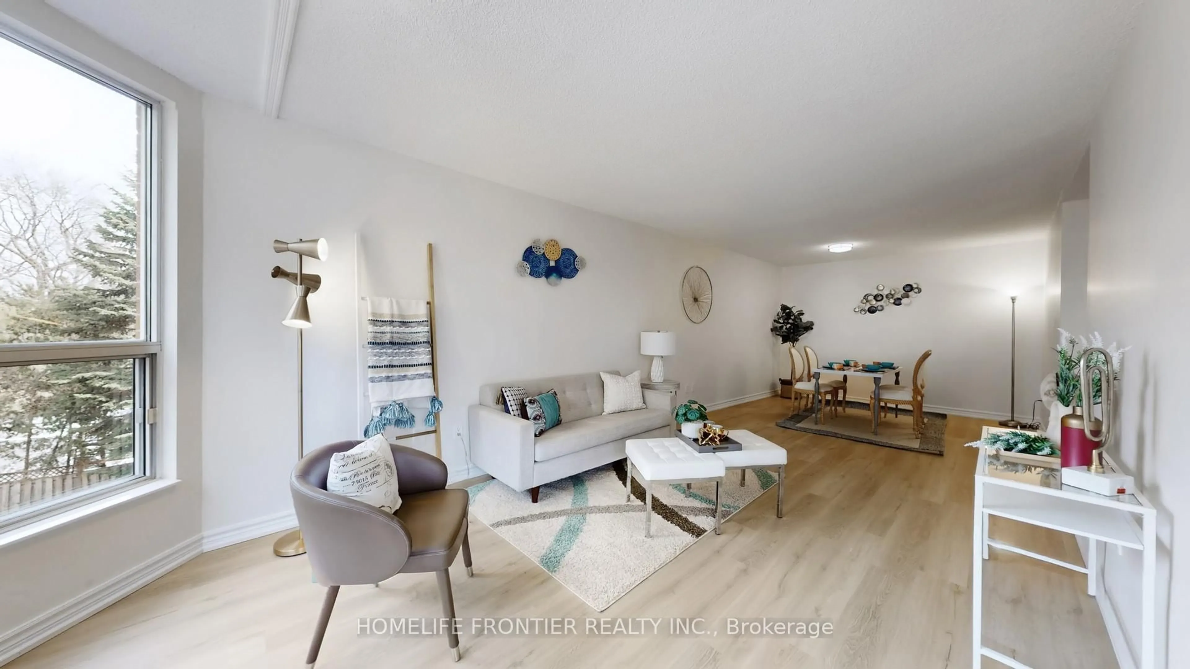 Living room with furniture, wood/laminate floor for 9 Chalmers Rd #306, Richmond Hill Ontario L4B 3N3