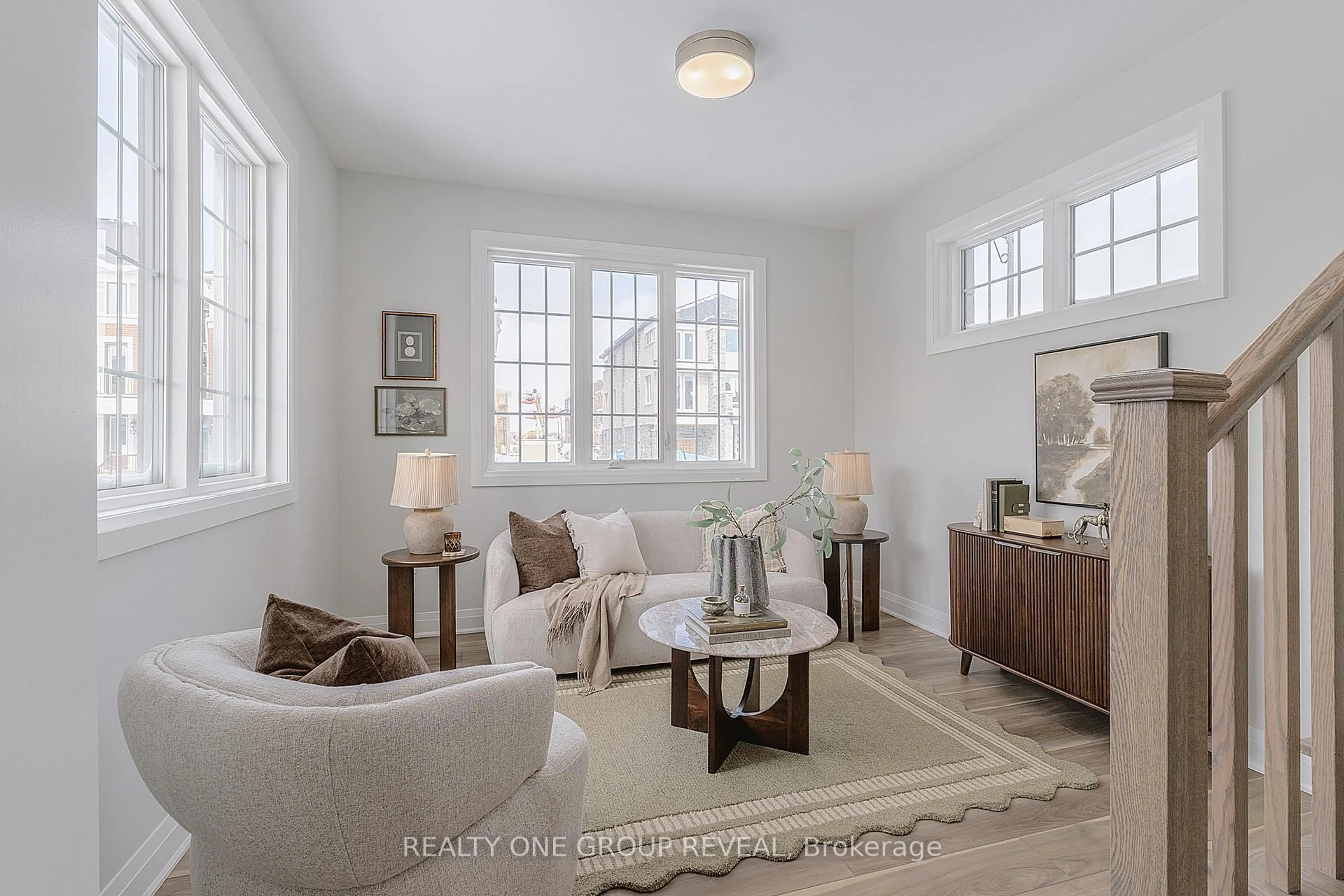 Living room with furniture, unknown for 27 Moss Dr, Markham Ontario L6C 1N3