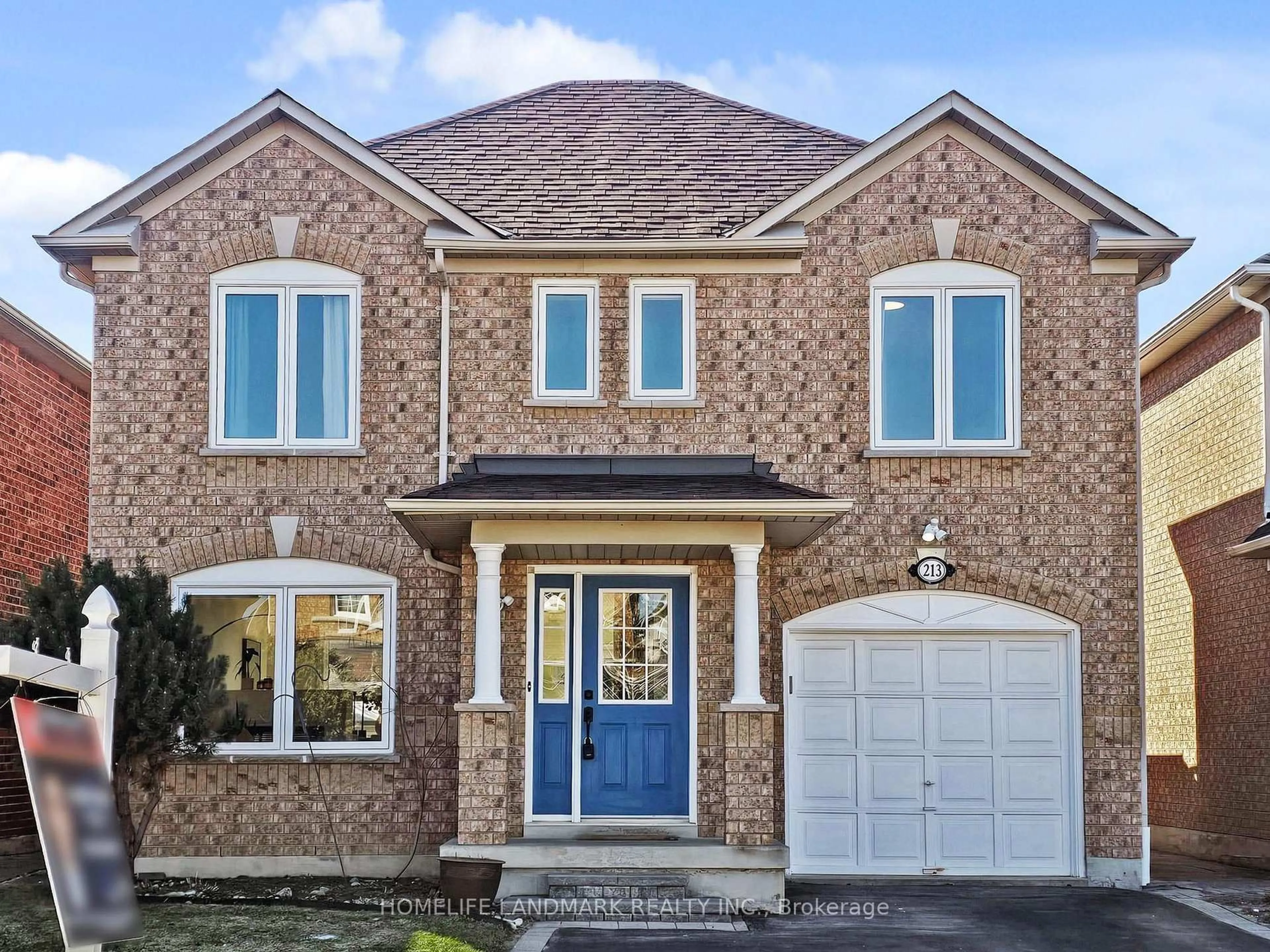Home with brick exterior material, street for 213 Montebello Ave, Vaughan Ontario L4H 1L9