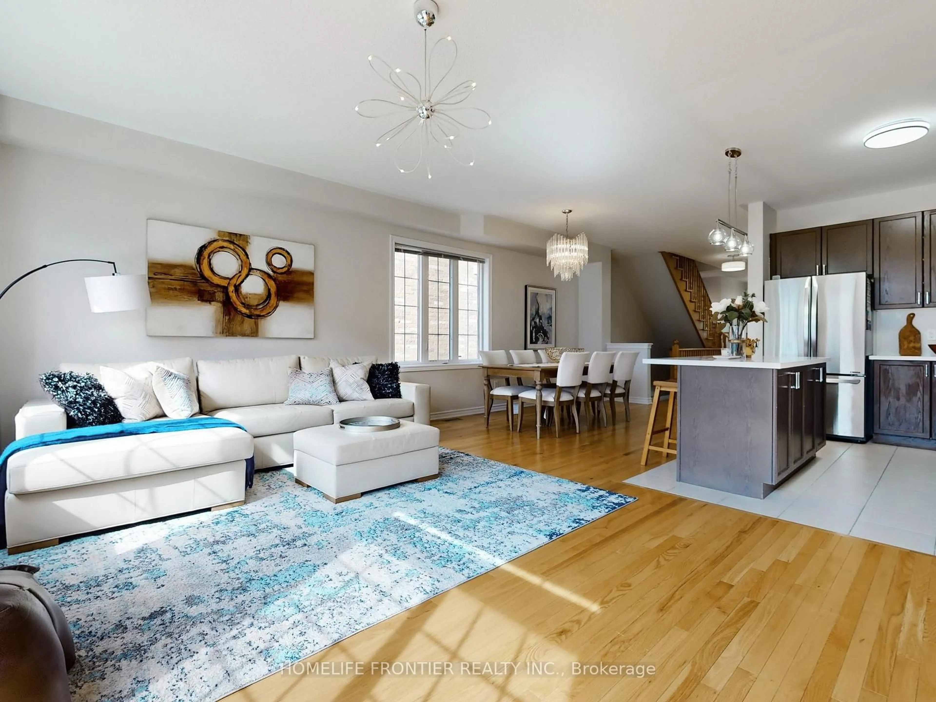 Living room with furniture, wood/laminate floor for 8777 Dufferin St #6, Vaughan Ontario L4J 8W3