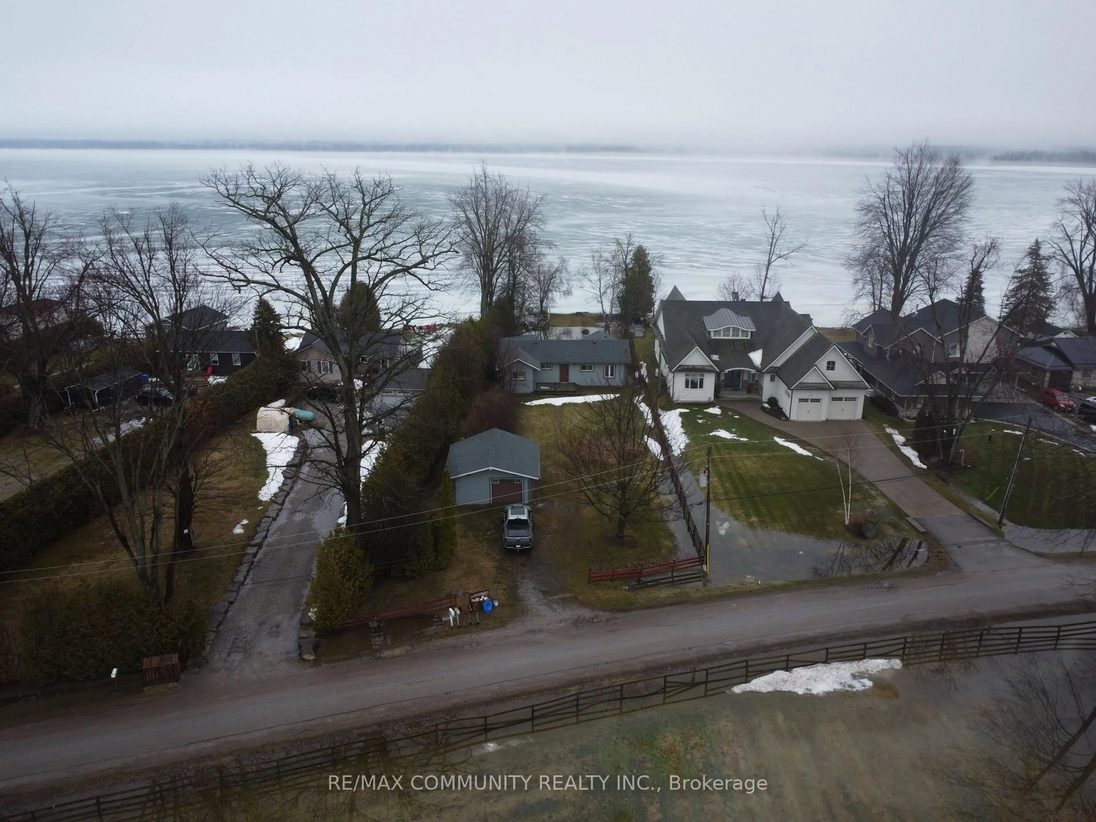 A pic from outside/outdoor area/front of a property/back of a property/a pic from drone, water/lake/river/ocean view for 579 Duclos Point Rd, Georgina Ontario L0E 1N0