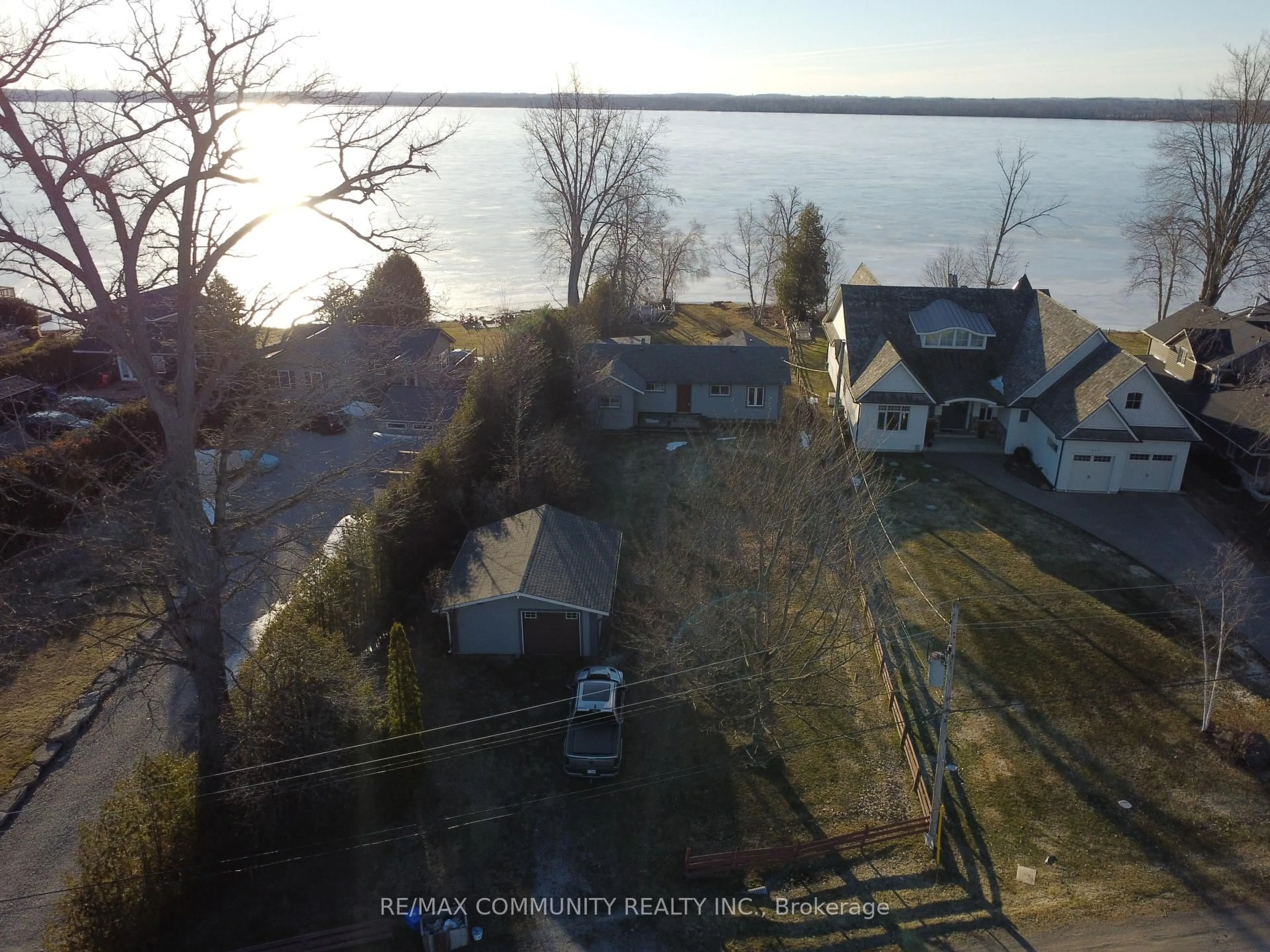 A pic from outside/outdoor area/front of a property/back of a property/a pic from drone, water/lake/river/ocean view for 579 Duclos Point Rd, Georgina Ontario L0E 1N0
