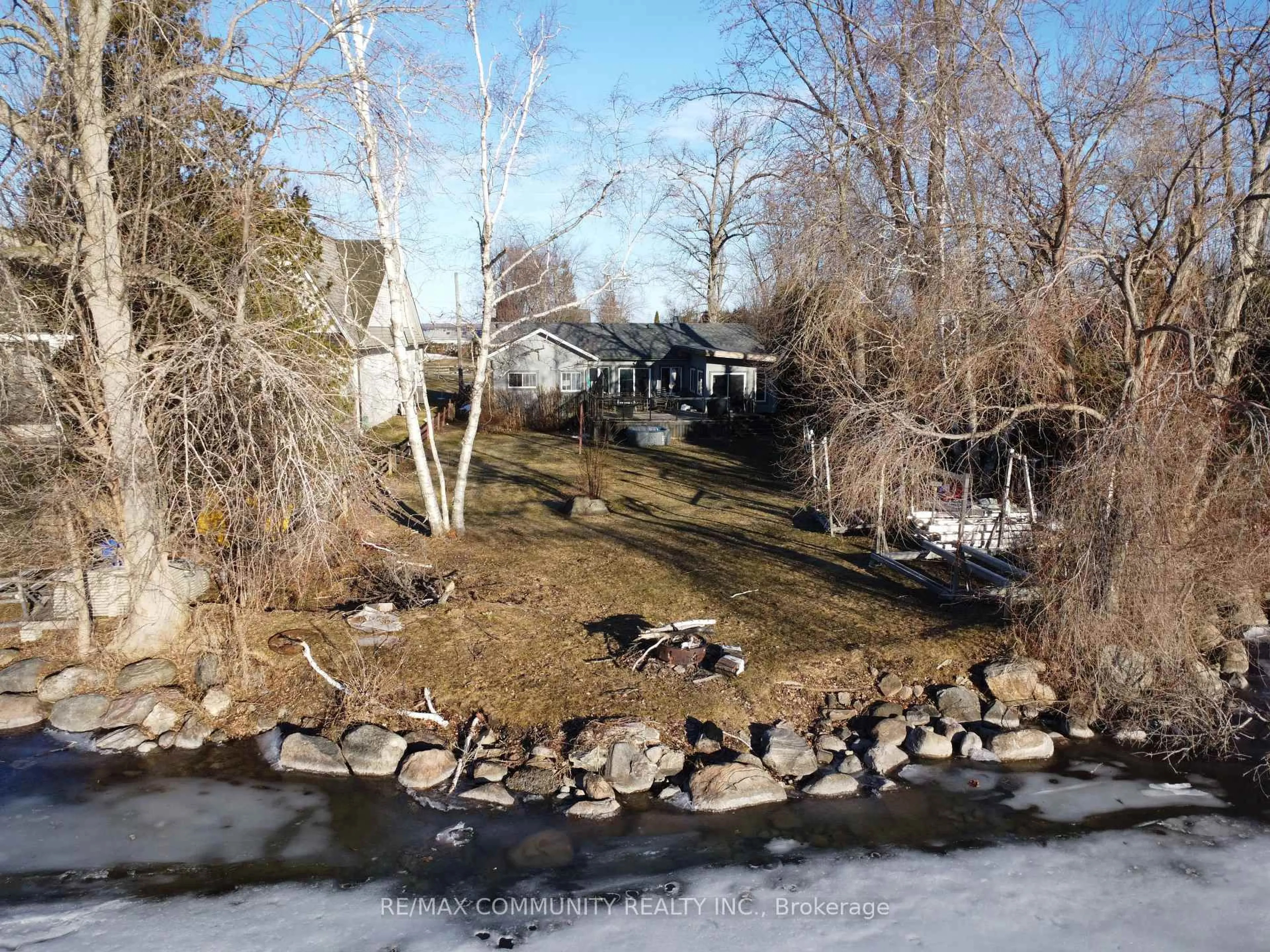 A pic from outside/outdoor area/front of a property/back of a property/a pic from drone, water/lake/river/ocean view for 579 Duclos Point Rd, Georgina Ontario L0E 1N0