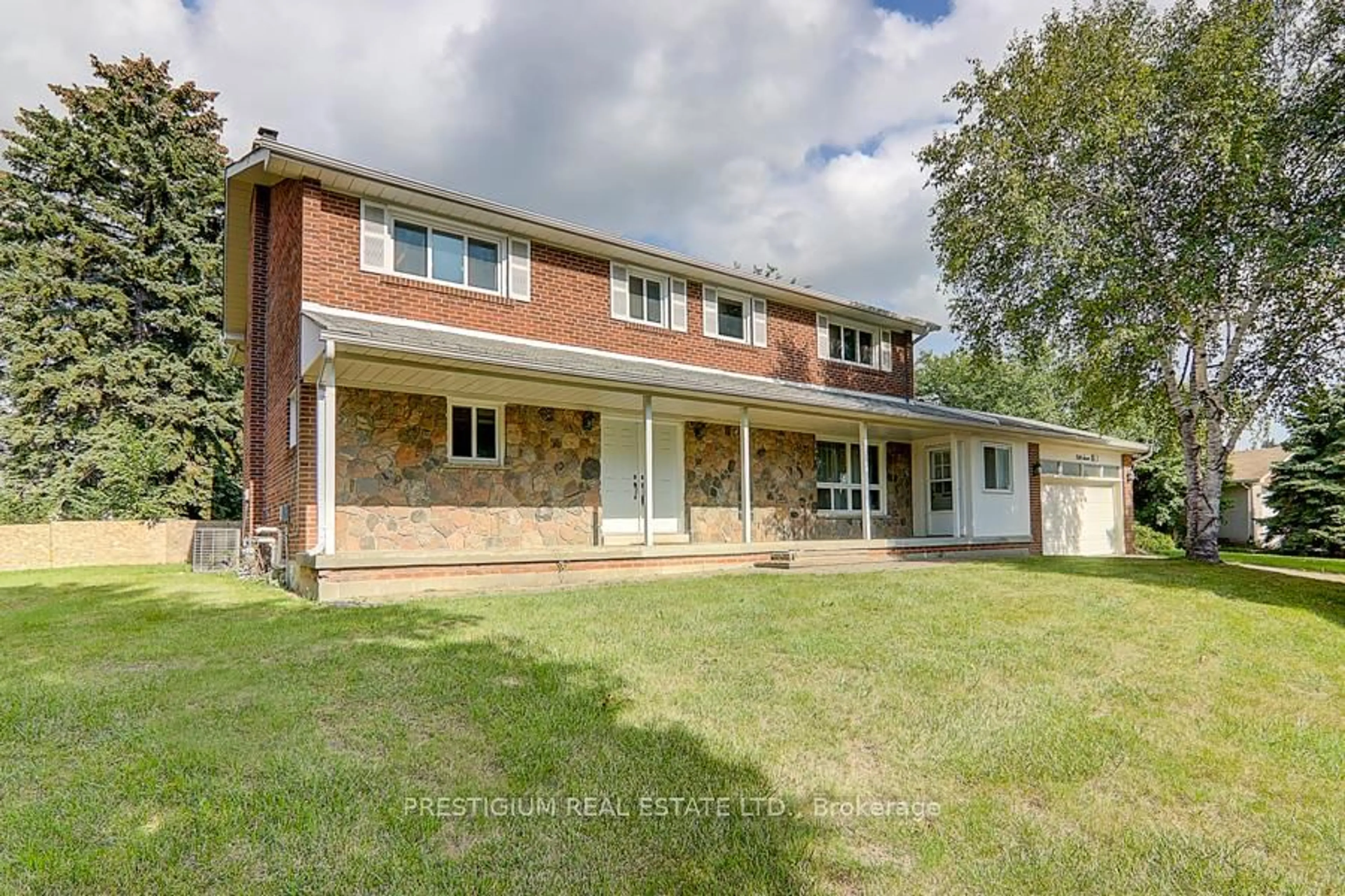 Home with brick exterior material, street for 57 Laureleaf Rd, Markham Ontario L3T 2X9