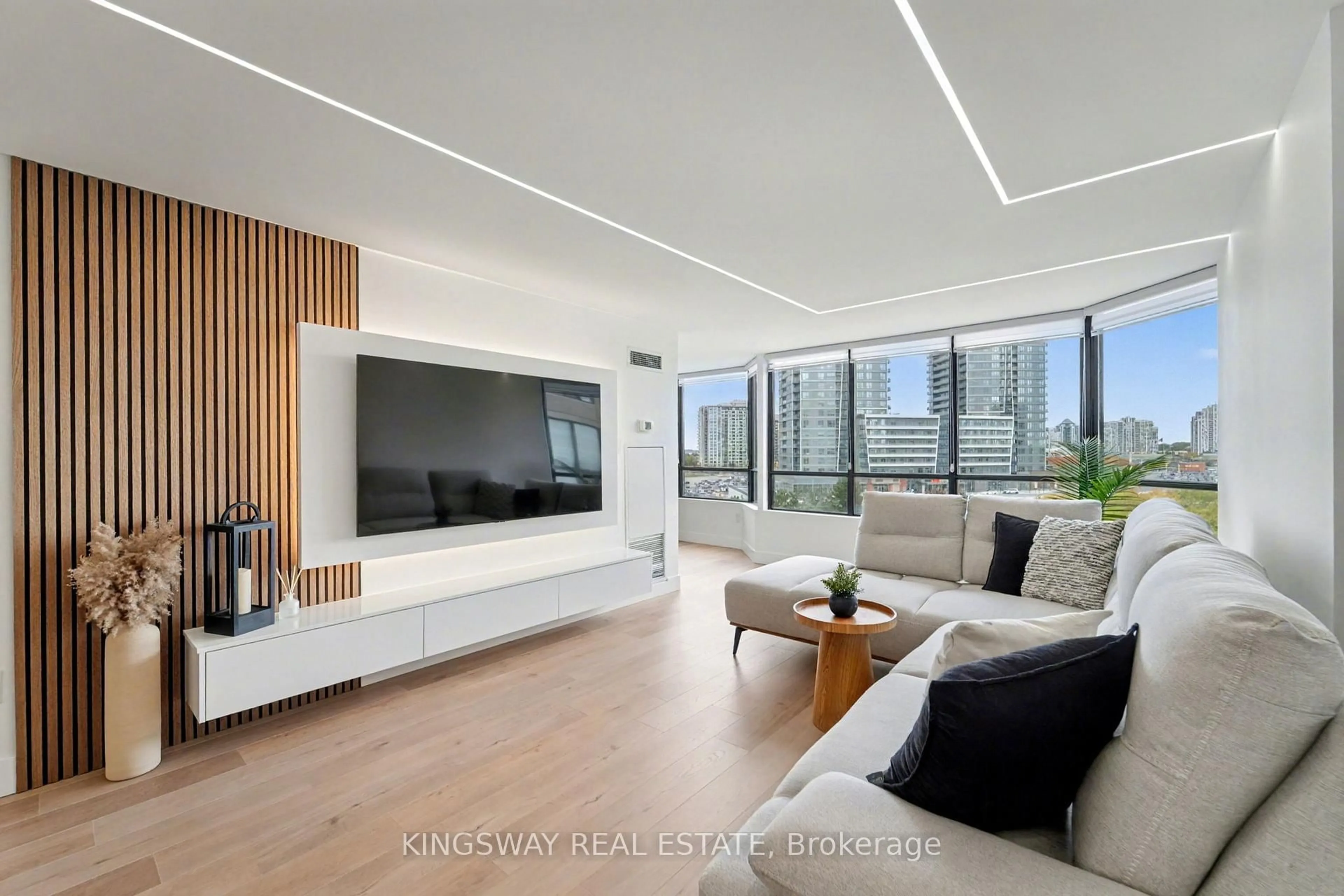 Living room with furniture, wood/laminate floor for 7420 Bathurst St #712, Vaughan Ontario L4J 6X4