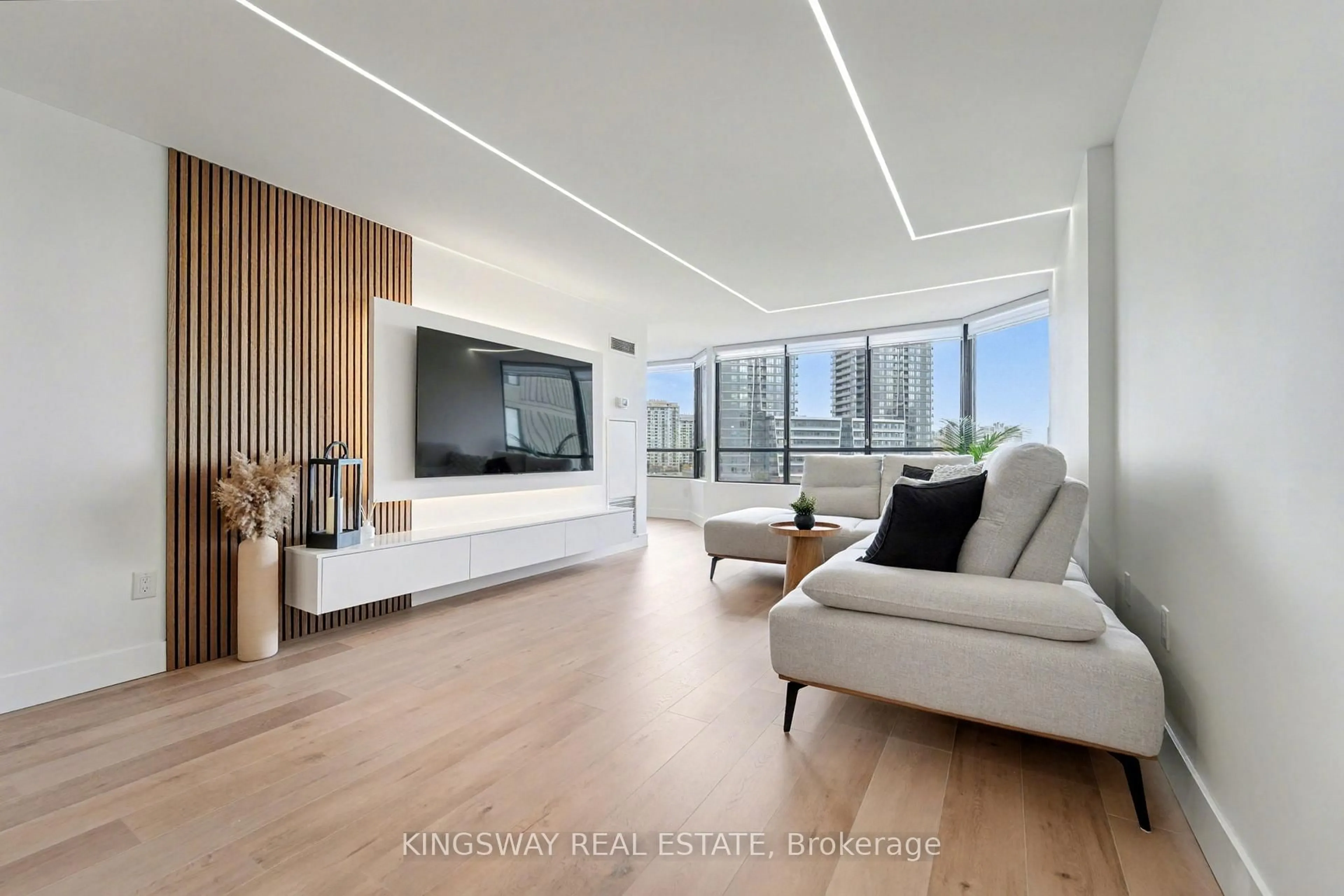 Living room with furniture, wood/laminate floor for 7420 Bathurst St #712, Vaughan Ontario L4J 6X4