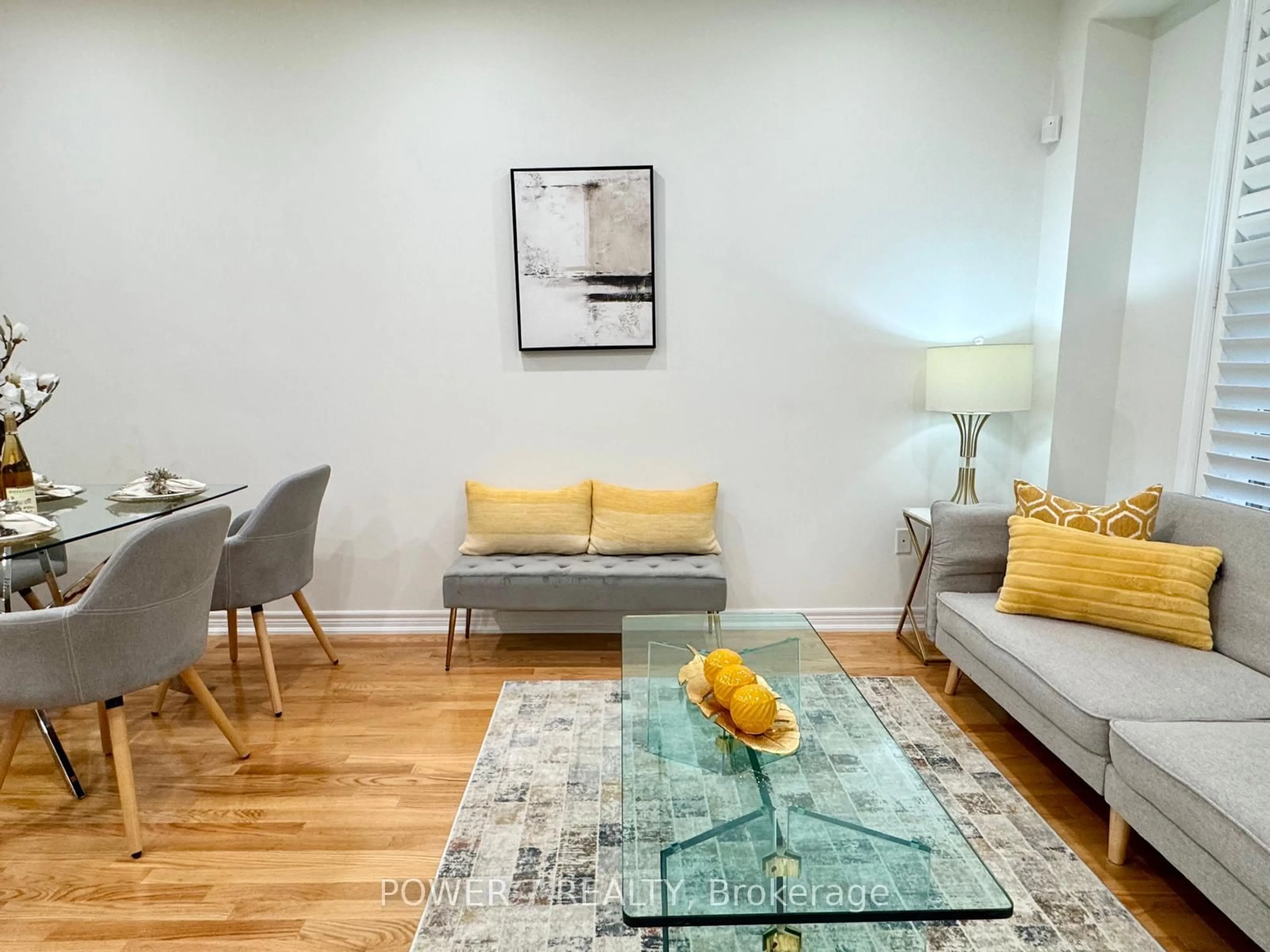 Living room with furniture, wood/laminate floor for 119 Gauguin Ave, Vaughan Ontario L4J 9J4