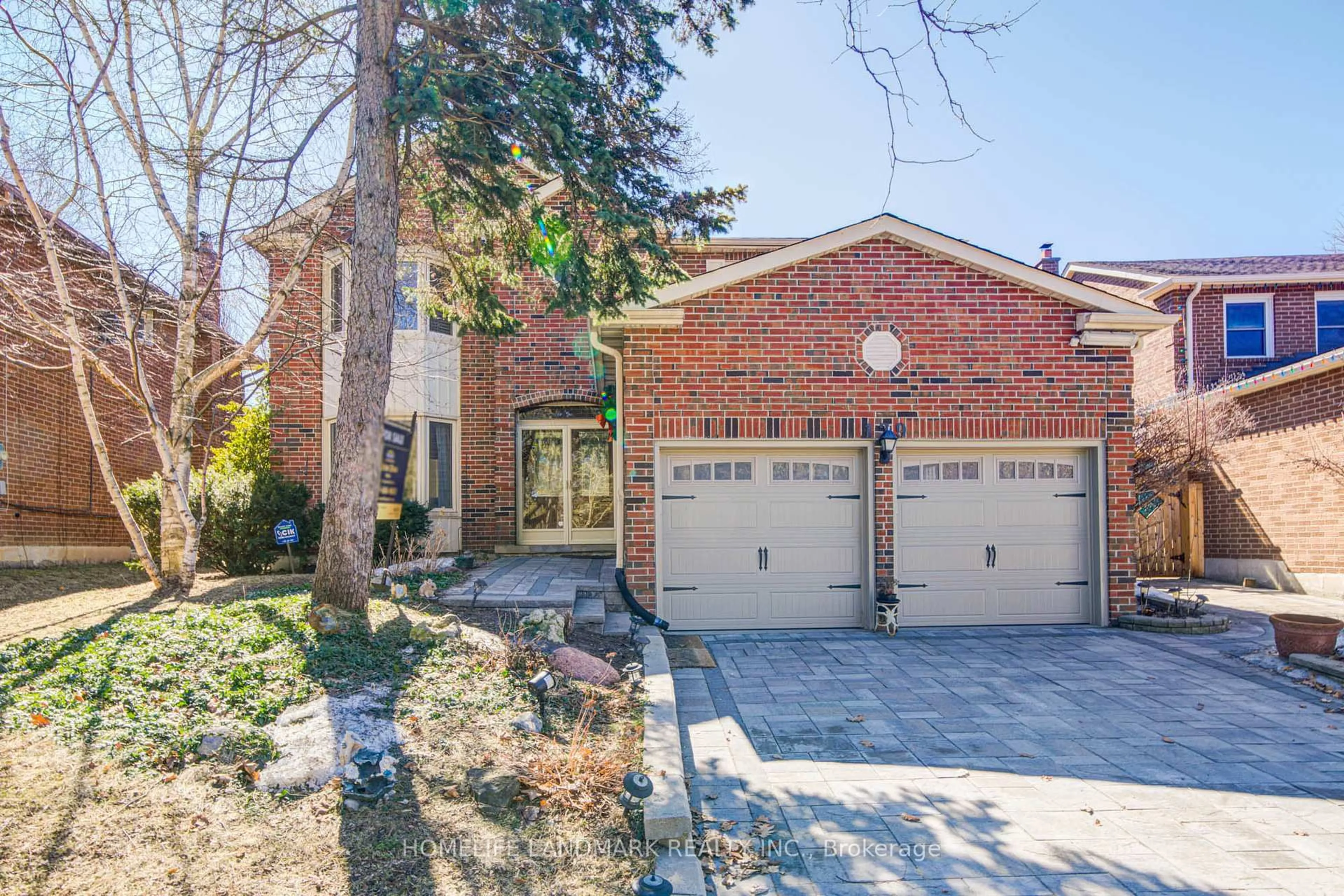 Home with brick exterior material, street for 129 Fincham Ave, Markham Ontario L3P 4A8