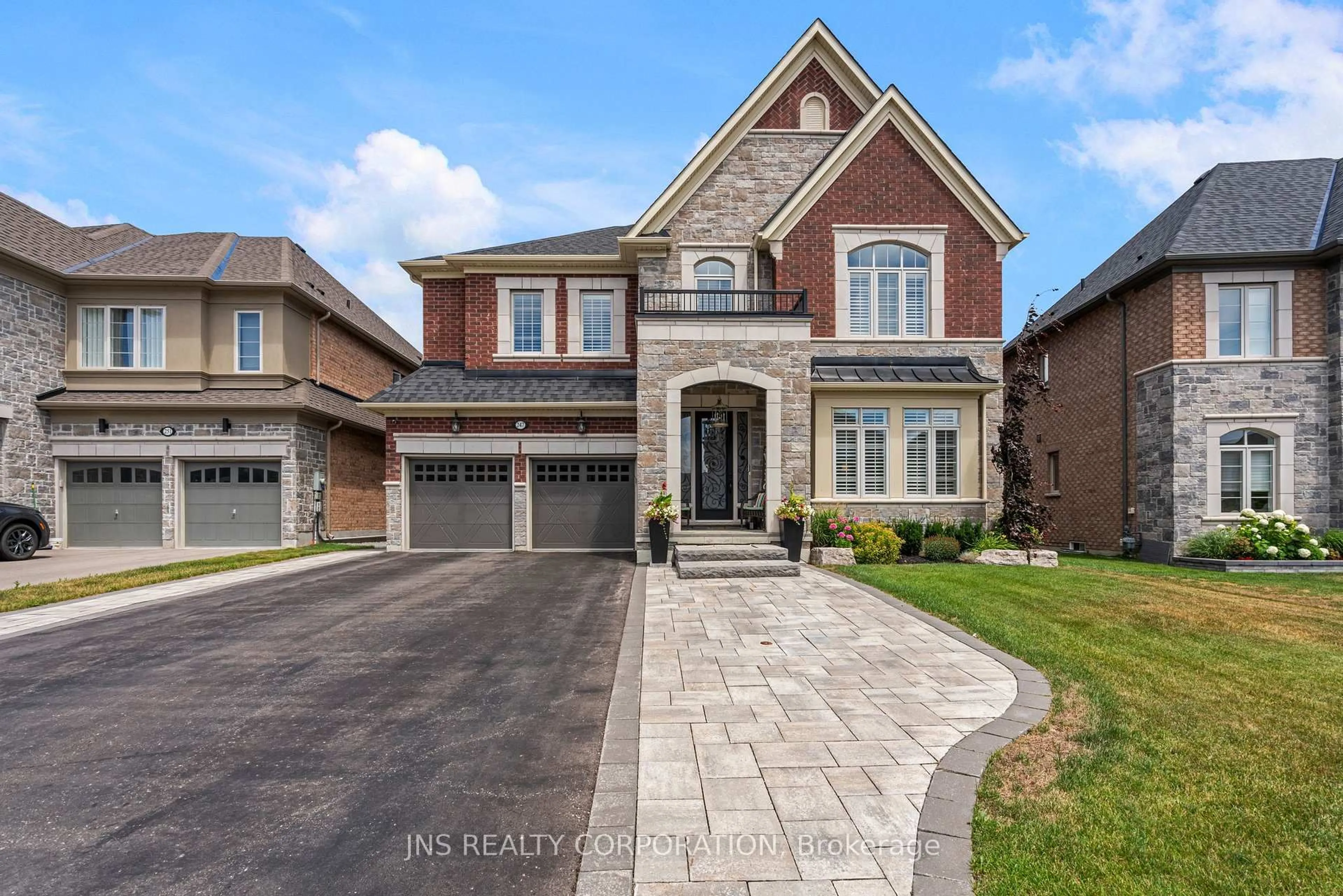 Home with brick exterior material, street for 247 Reg Harrison Tr, Newmarket Ontario L3X 0M4