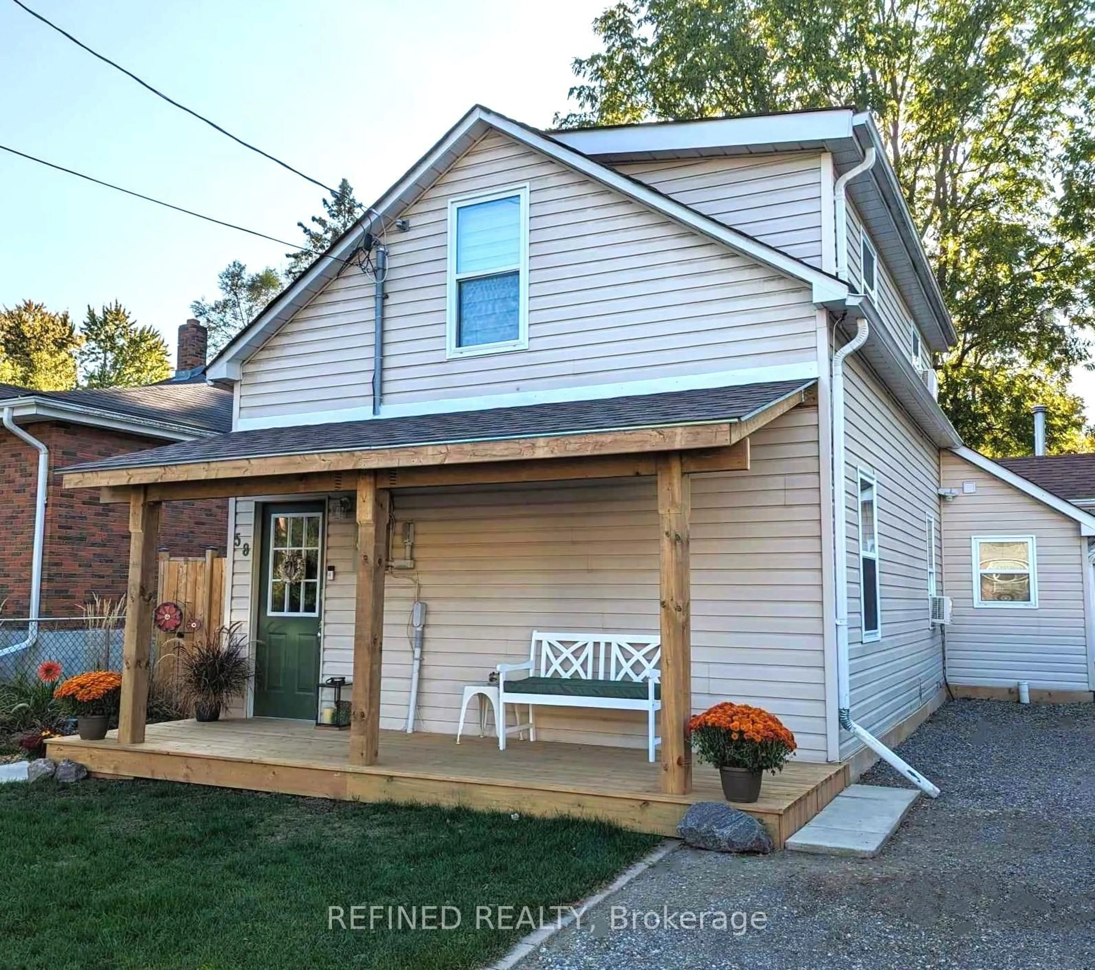 Home with vinyl exterior material, street for 58 Church St, New Tecumseth Ontario L9R 1G9