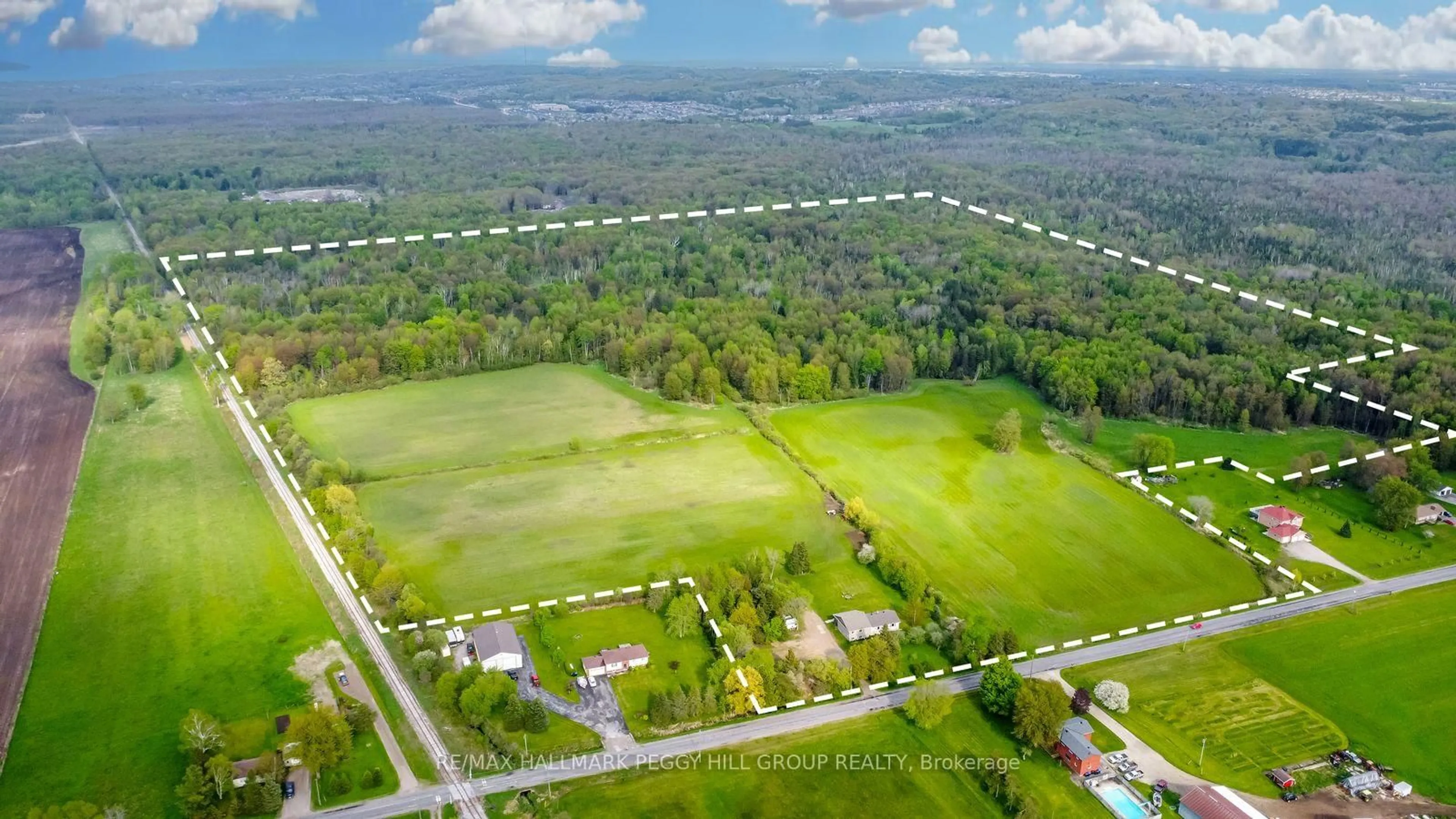 A pic from outside/outdoor area/front of a property/back of a property/a pic from drone, mountain view for 8747 10th Line, Essa Ontario L4M 4S4