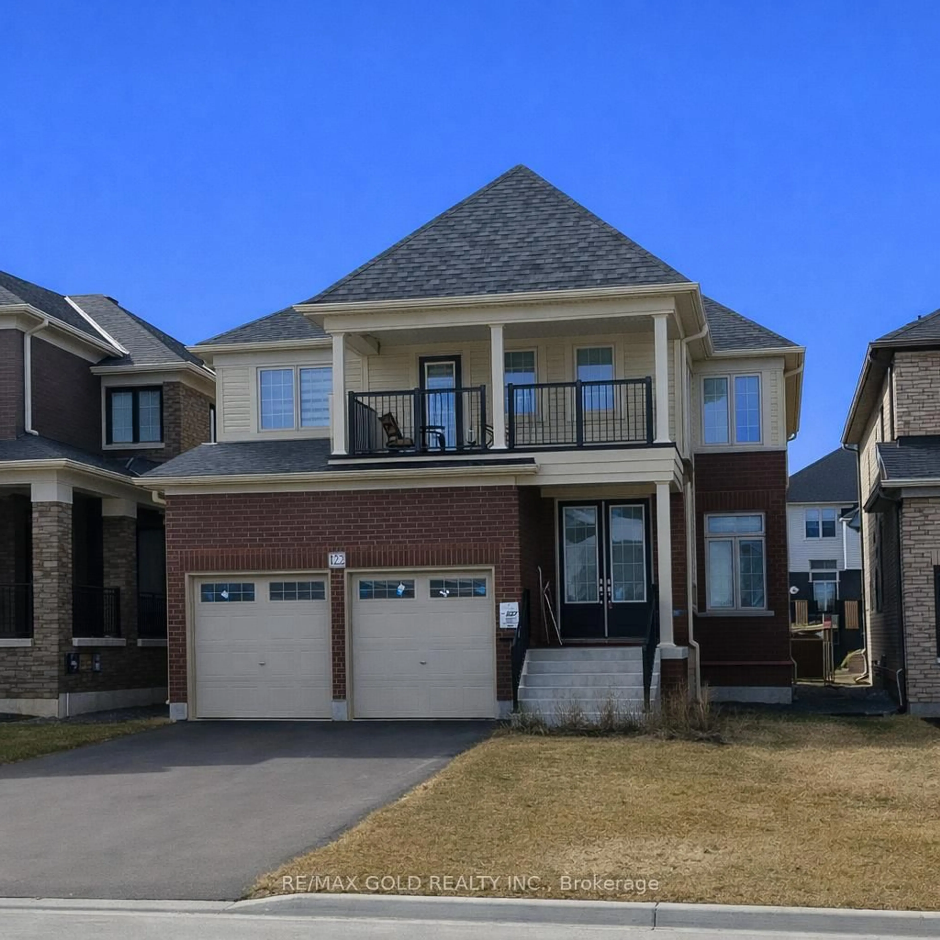 Home with brick exterior material, street for 122 Bluebird Blvd, Adjala-Tosorontio Ontario L0G 1W0