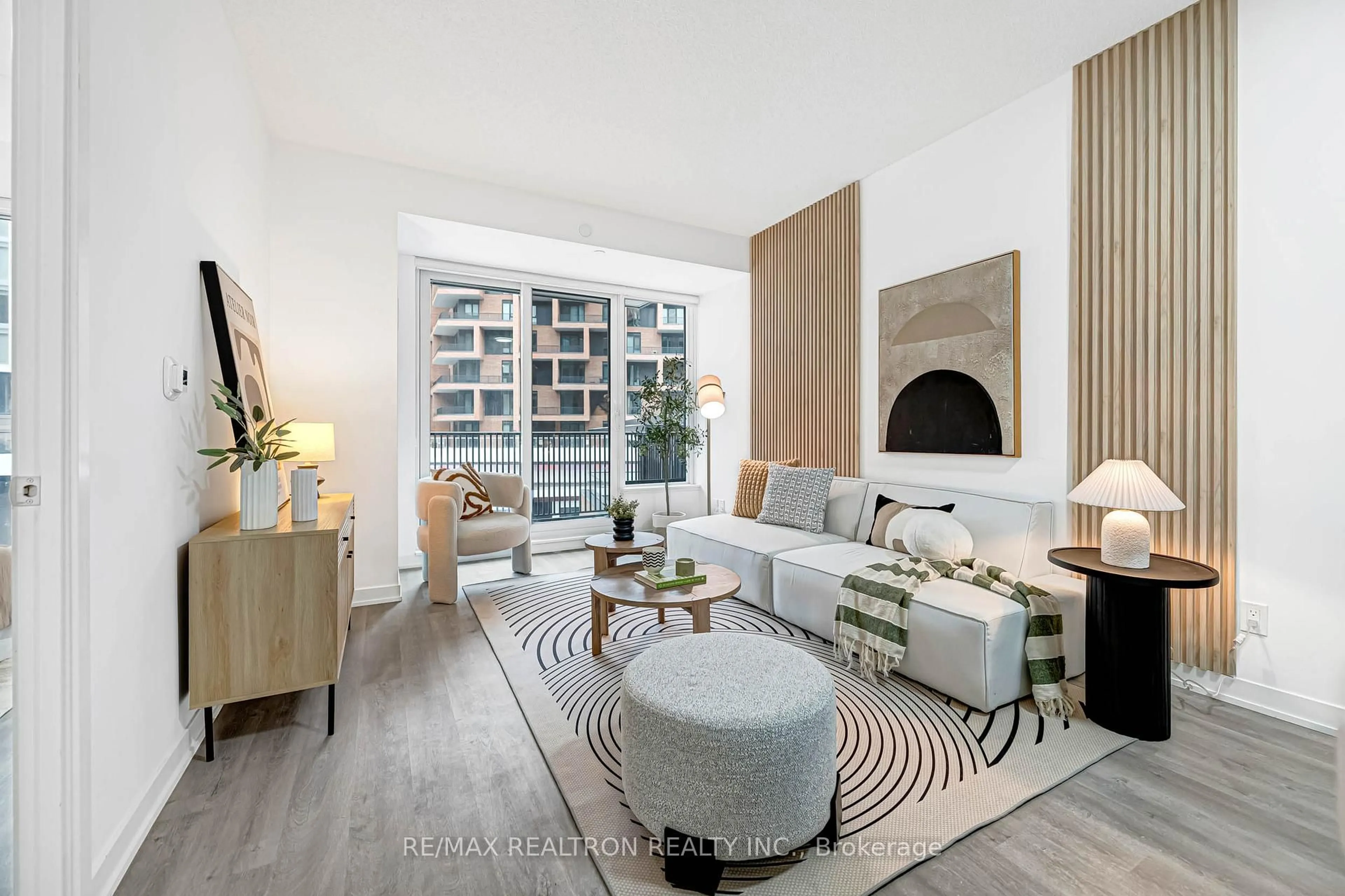 Living room with furniture, wood/laminate floor for 38 Simcoe Prom #403C, Markham Ontario L6G 0H7