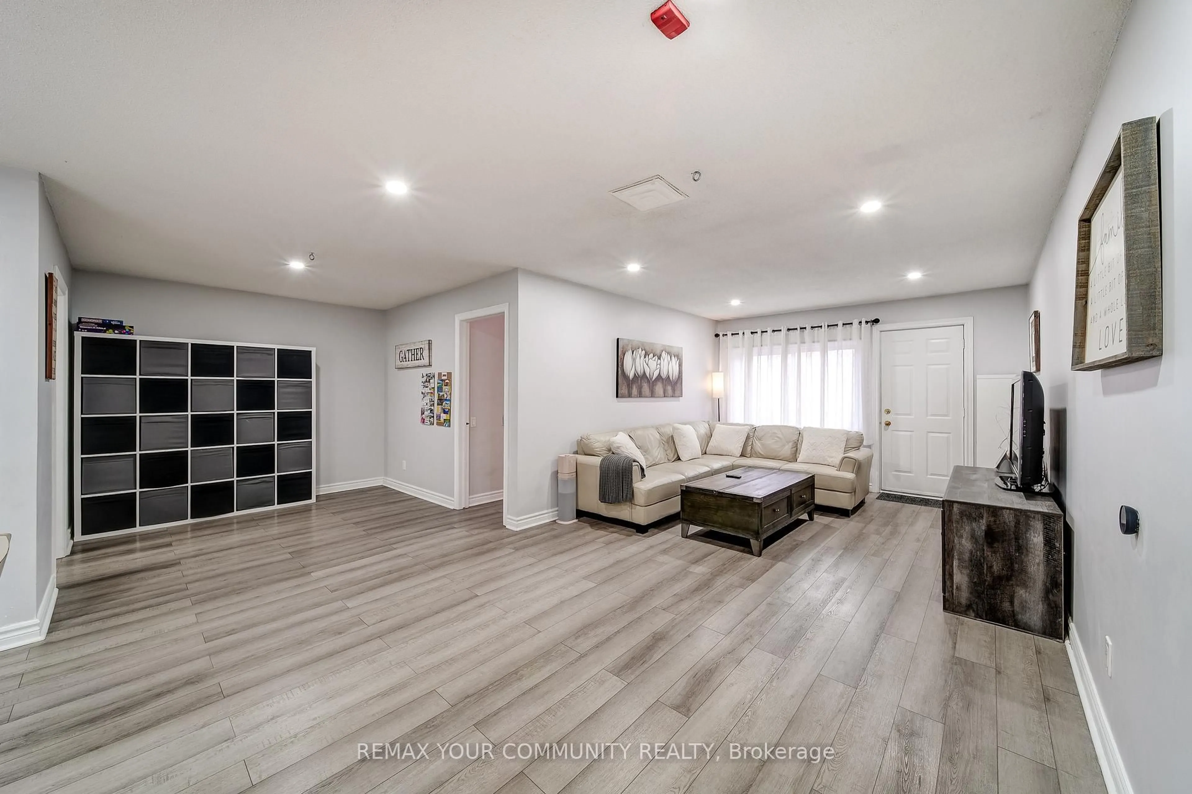 Living room with furniture, unknown for 77 Mill St #3, New Tecumseth Ontario L0G 1W0