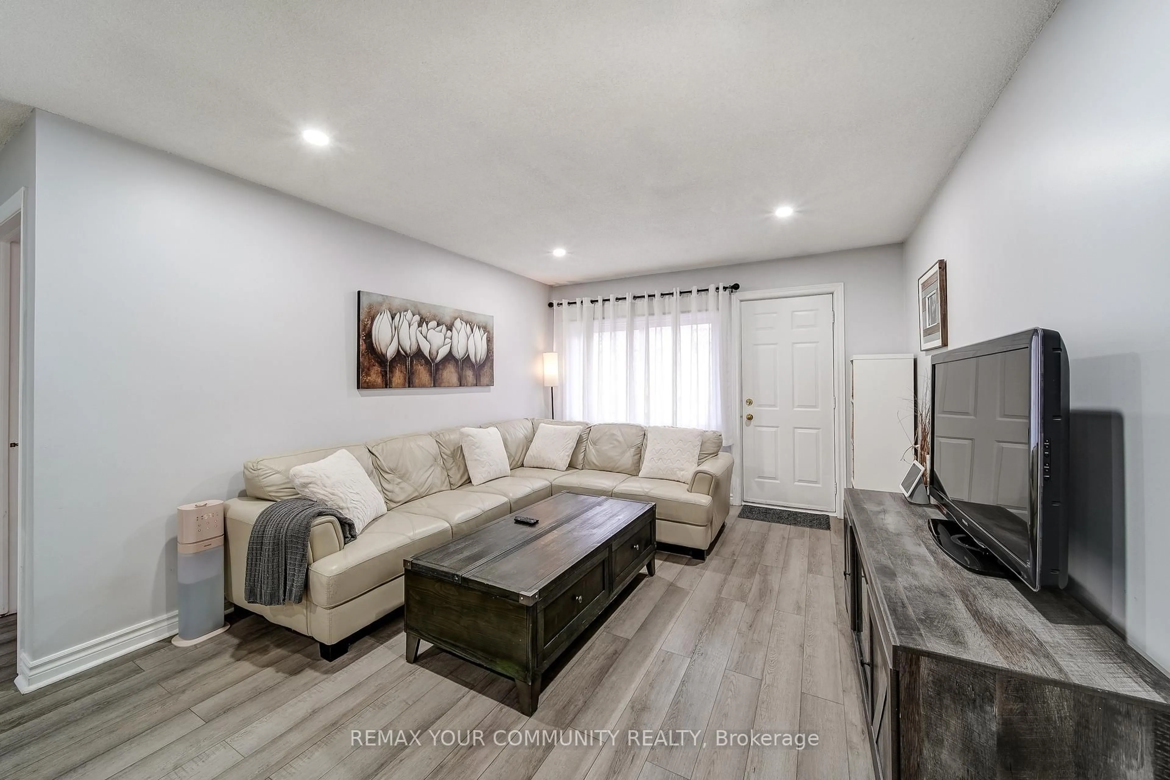 Living room with furniture, unknown for 77 Mill St #3, New Tecumseth Ontario L0G 1W0