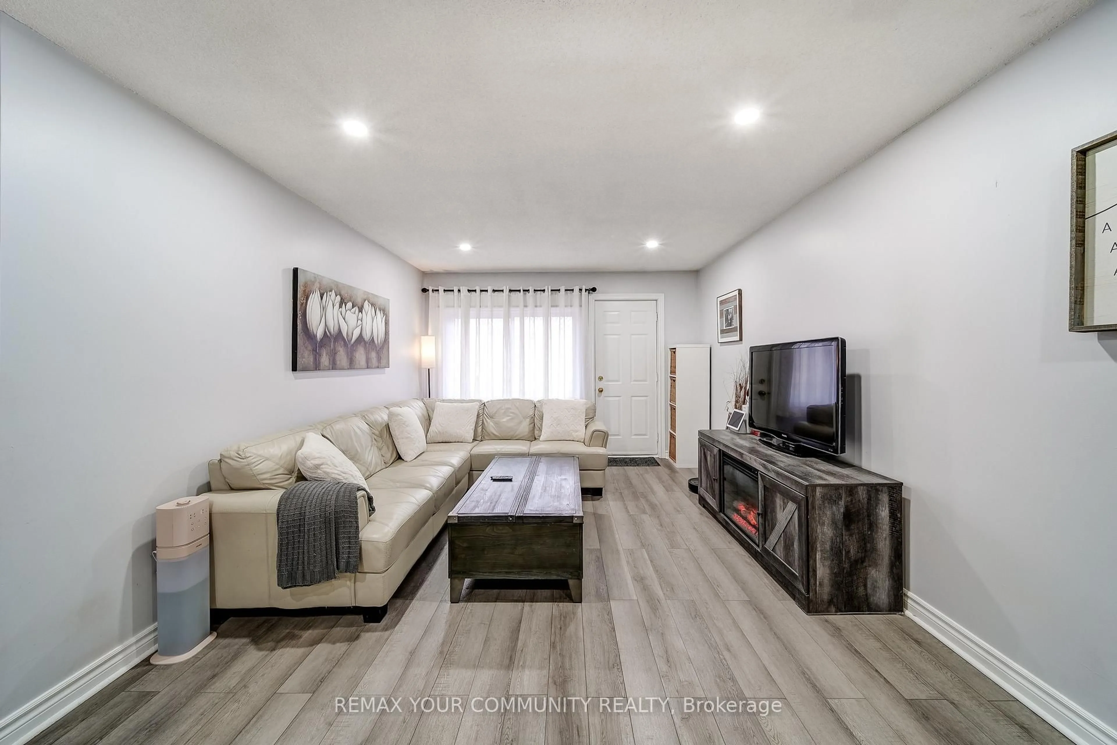 Living room with furniture, unknown for 77 Mill St #3, New Tecumseth Ontario L0G 1W0