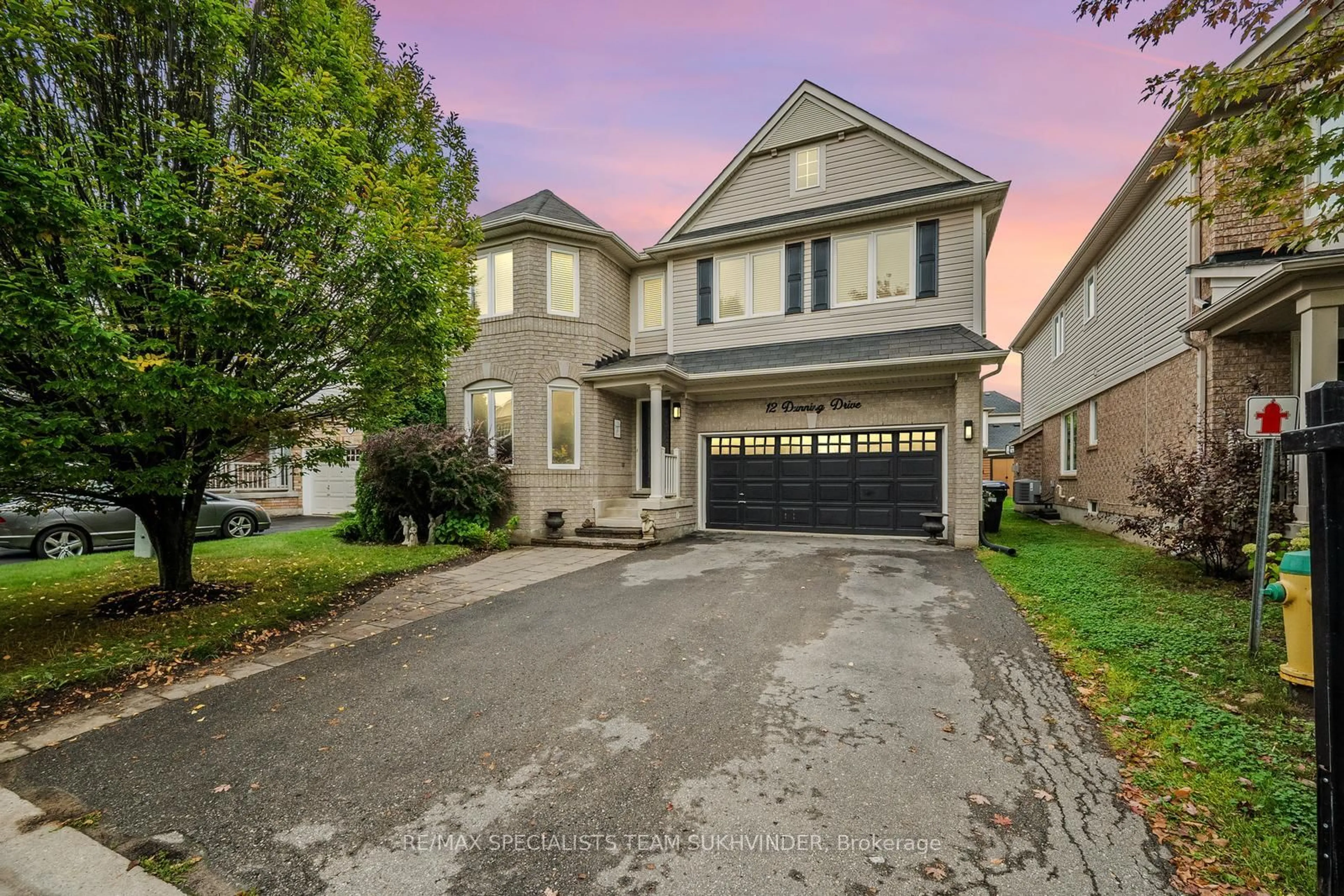 Home with vinyl exterior material, street for 12 Dunning Dr, New Tecumseth Ontario L9R 0B5