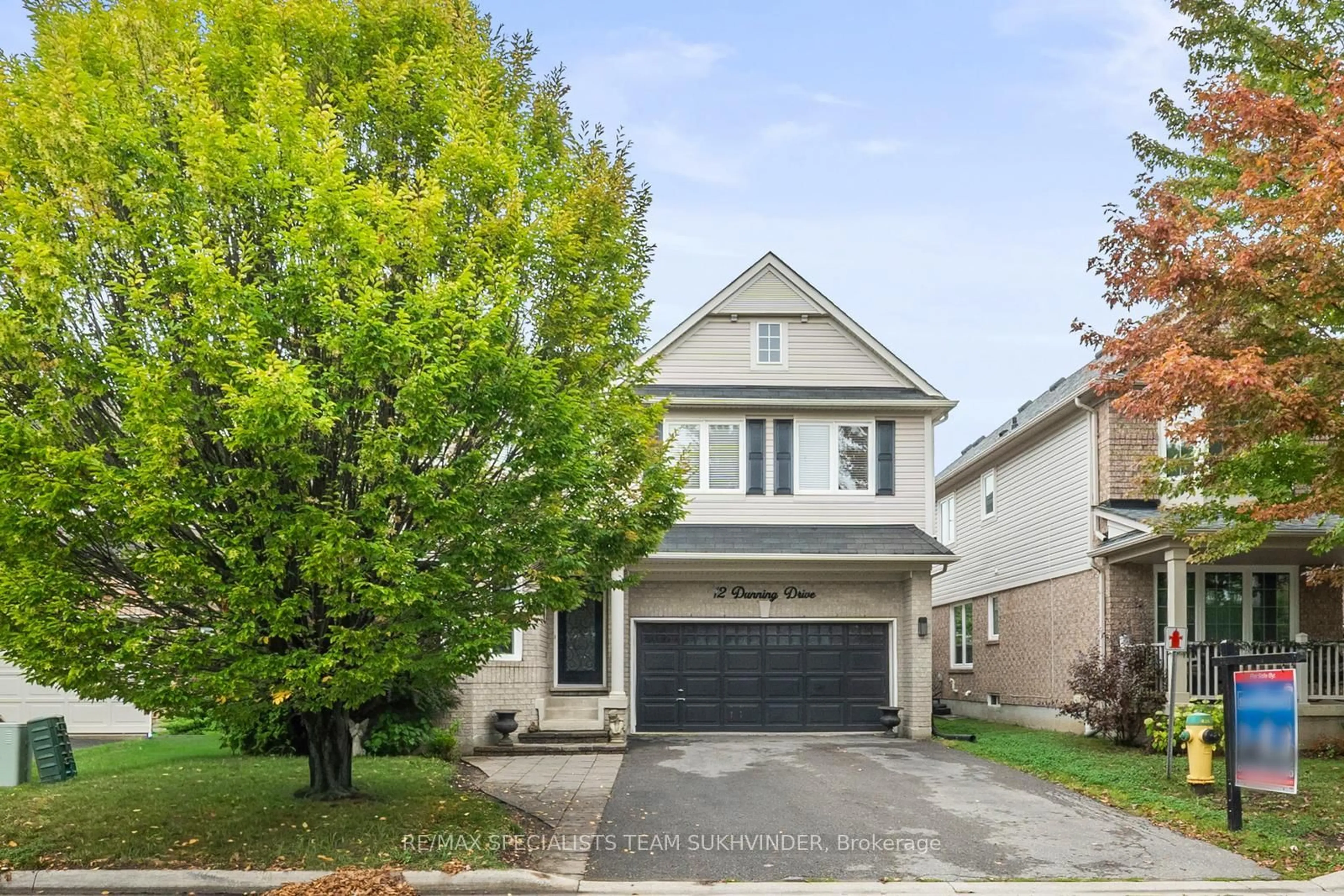 Home with vinyl exterior material, street for 12 Dunning Dr, New Tecumseth Ontario L9R 0B5