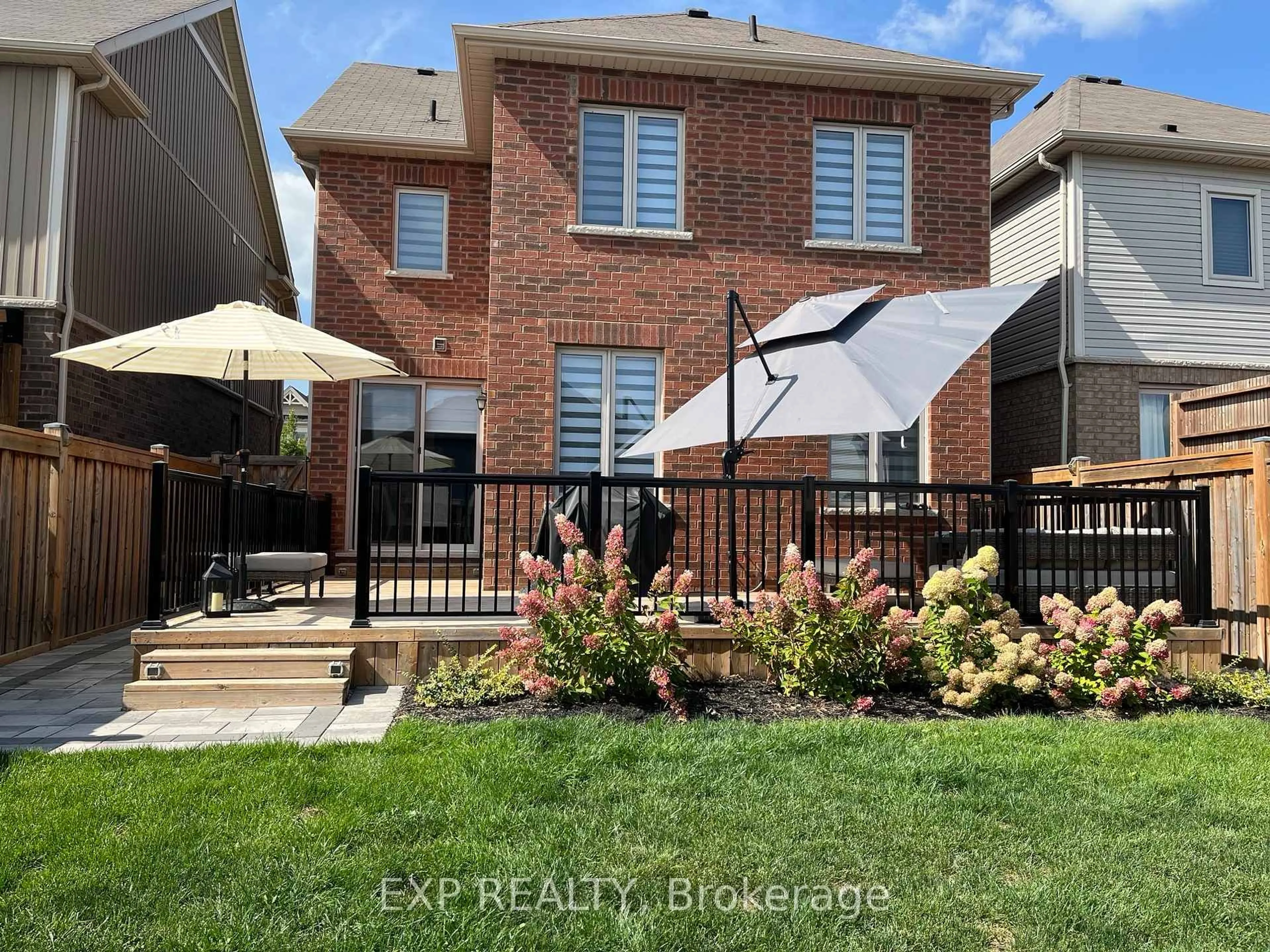 A pic from outside/outdoor area/front of a property/back of a property/a pic from drone, street for 71 Donnan Dr, New Tecumseth Ontario L0G 1W0