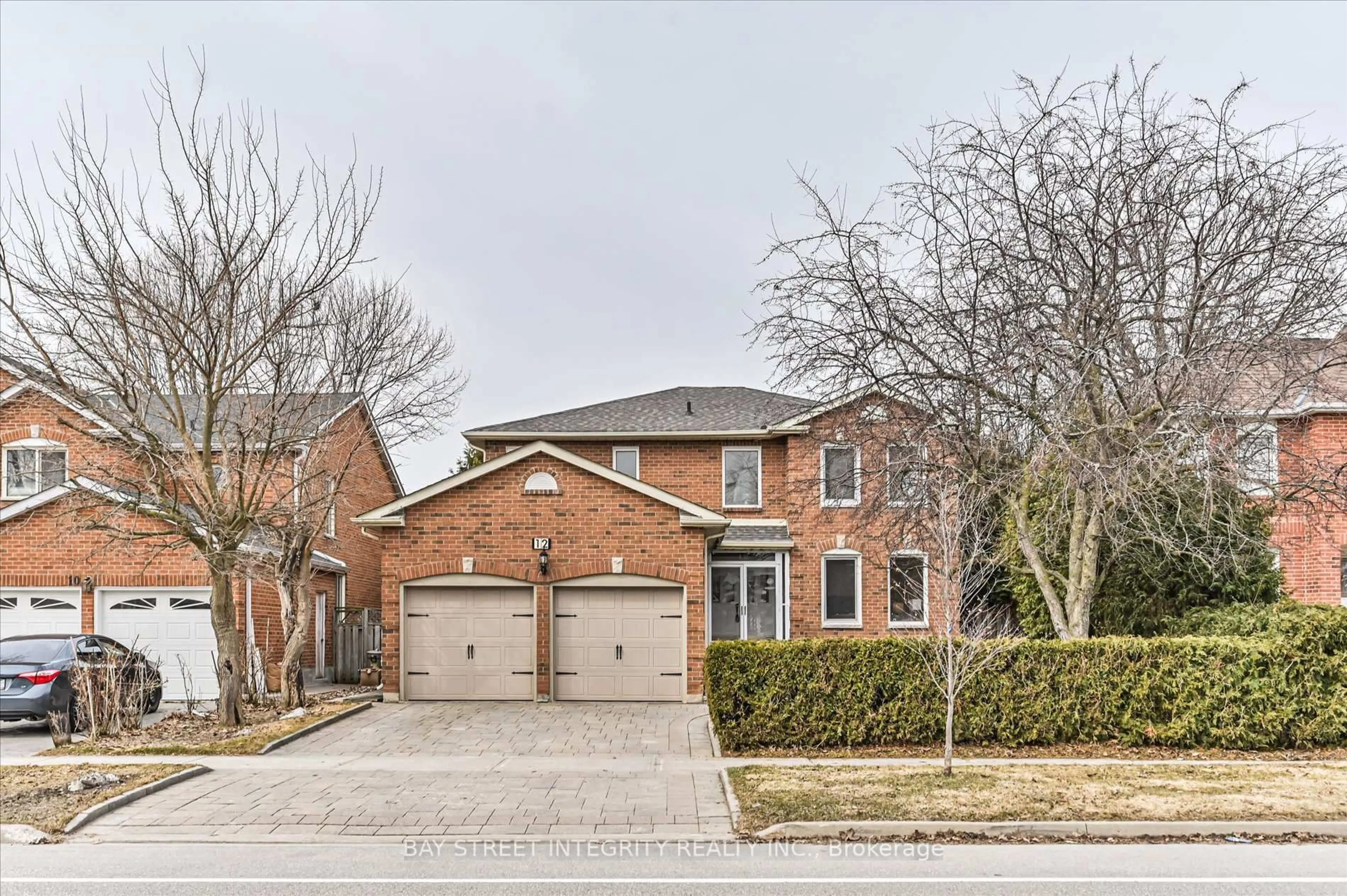Home with brick exterior material, street for 12 Greystone Rd, Markham Ontario L3R 8H9