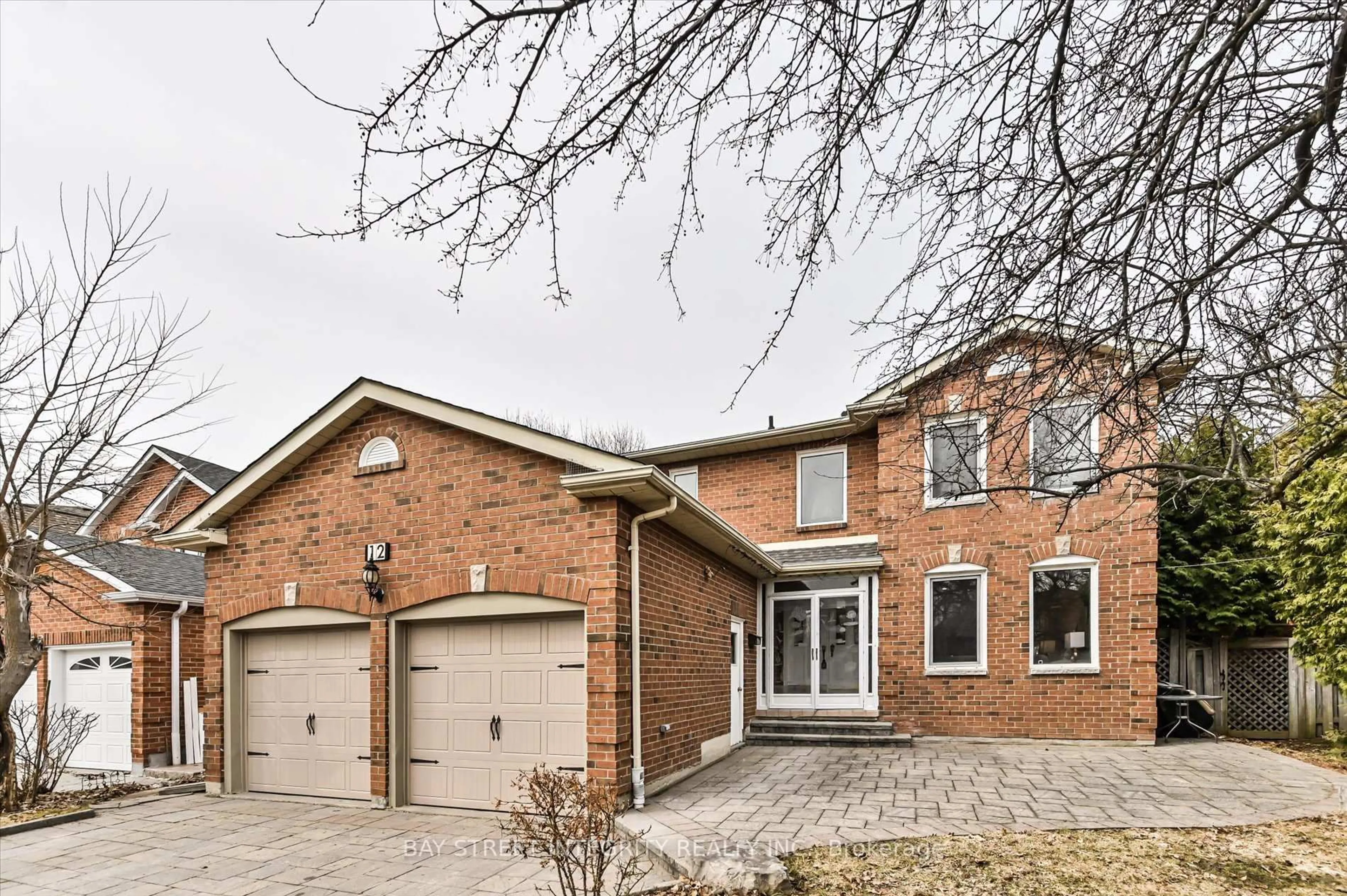Home with brick exterior material, street for 12 Greystone Rd, Markham Ontario L3R 8H9