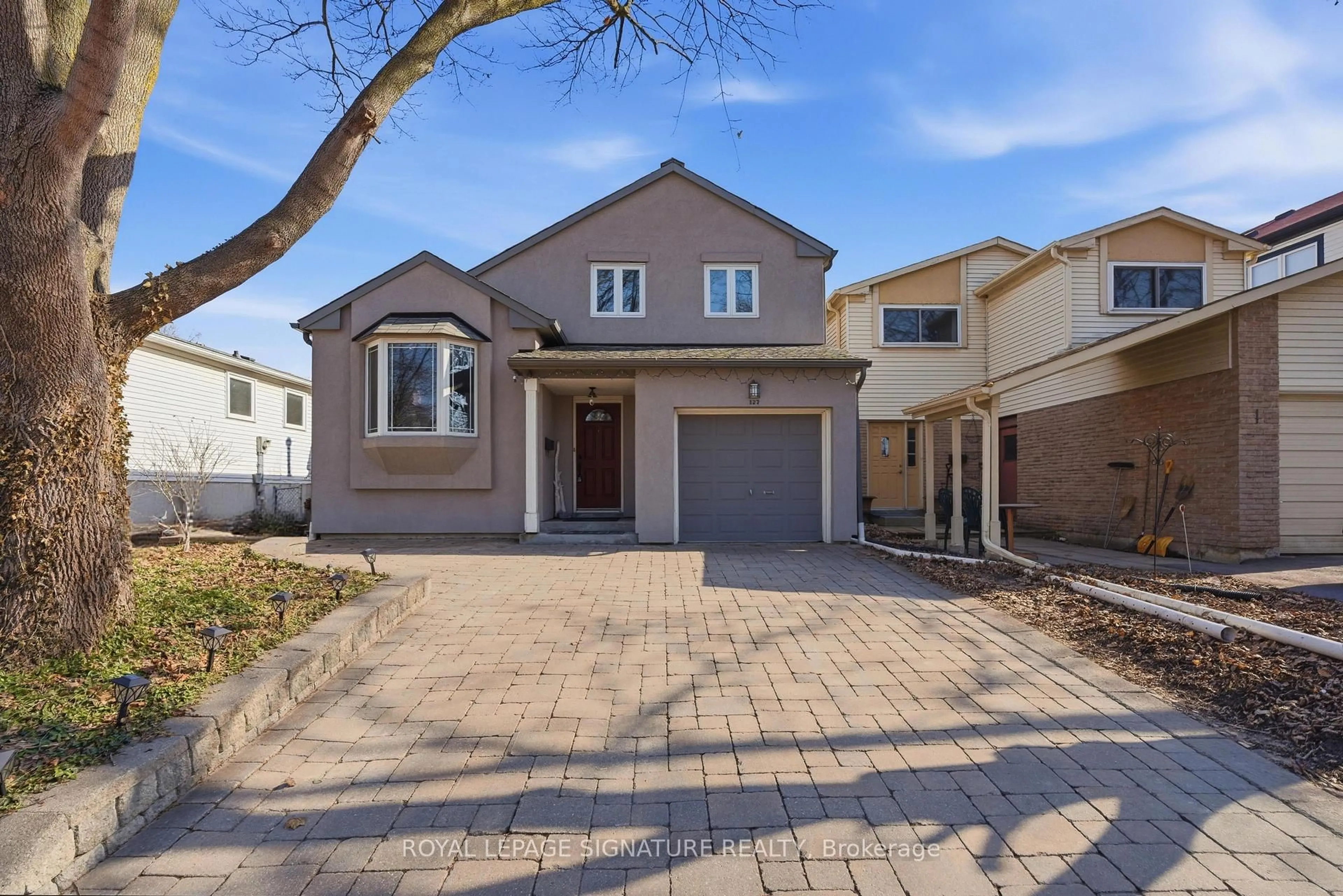 Home with brick exterior material, street for 127 Snowshoe Cres, Markham Ontario L3T 4N1