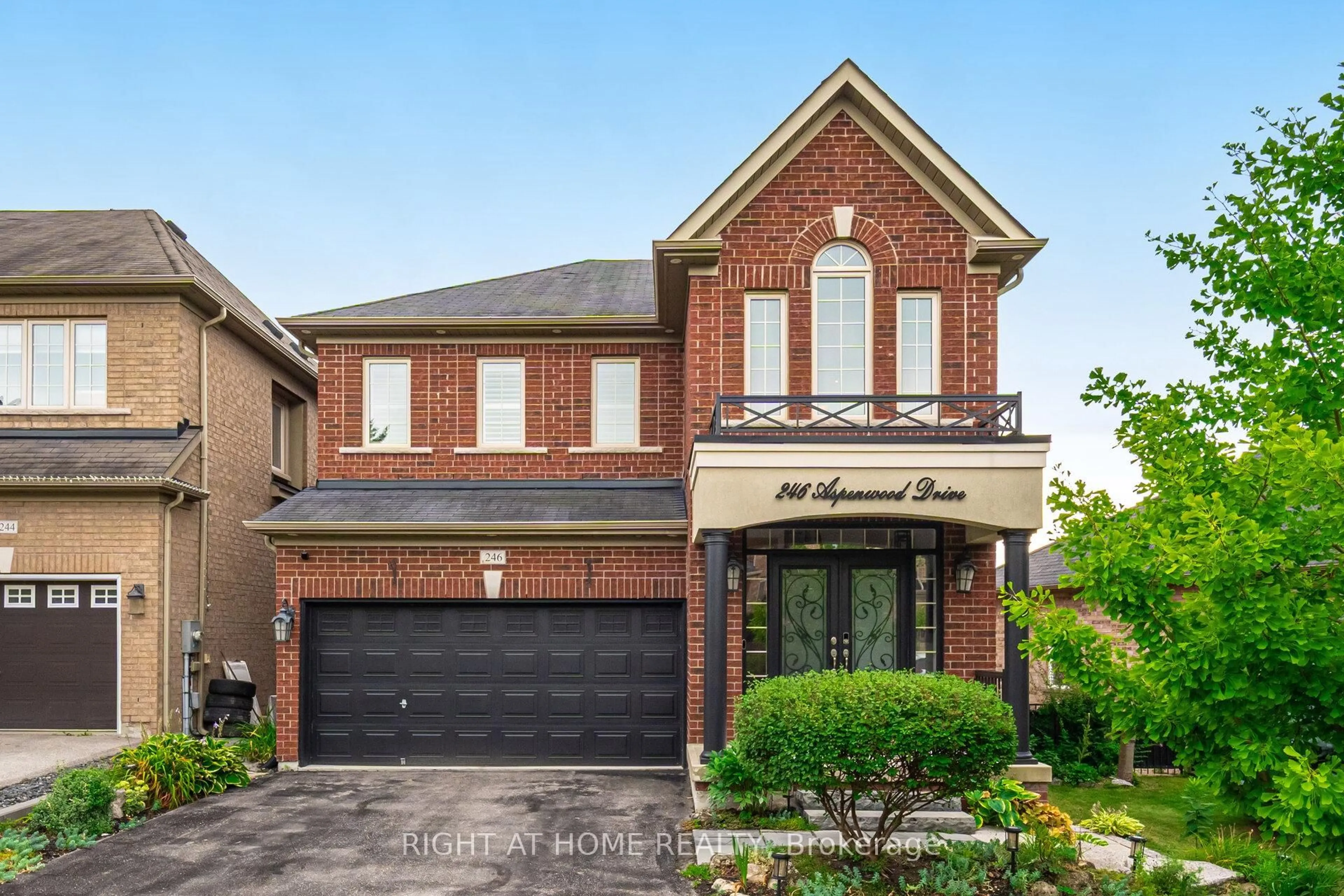 Home with brick exterior material, street for 246 Aspenwood Dr, Newmarket Ontario L3X 3K7