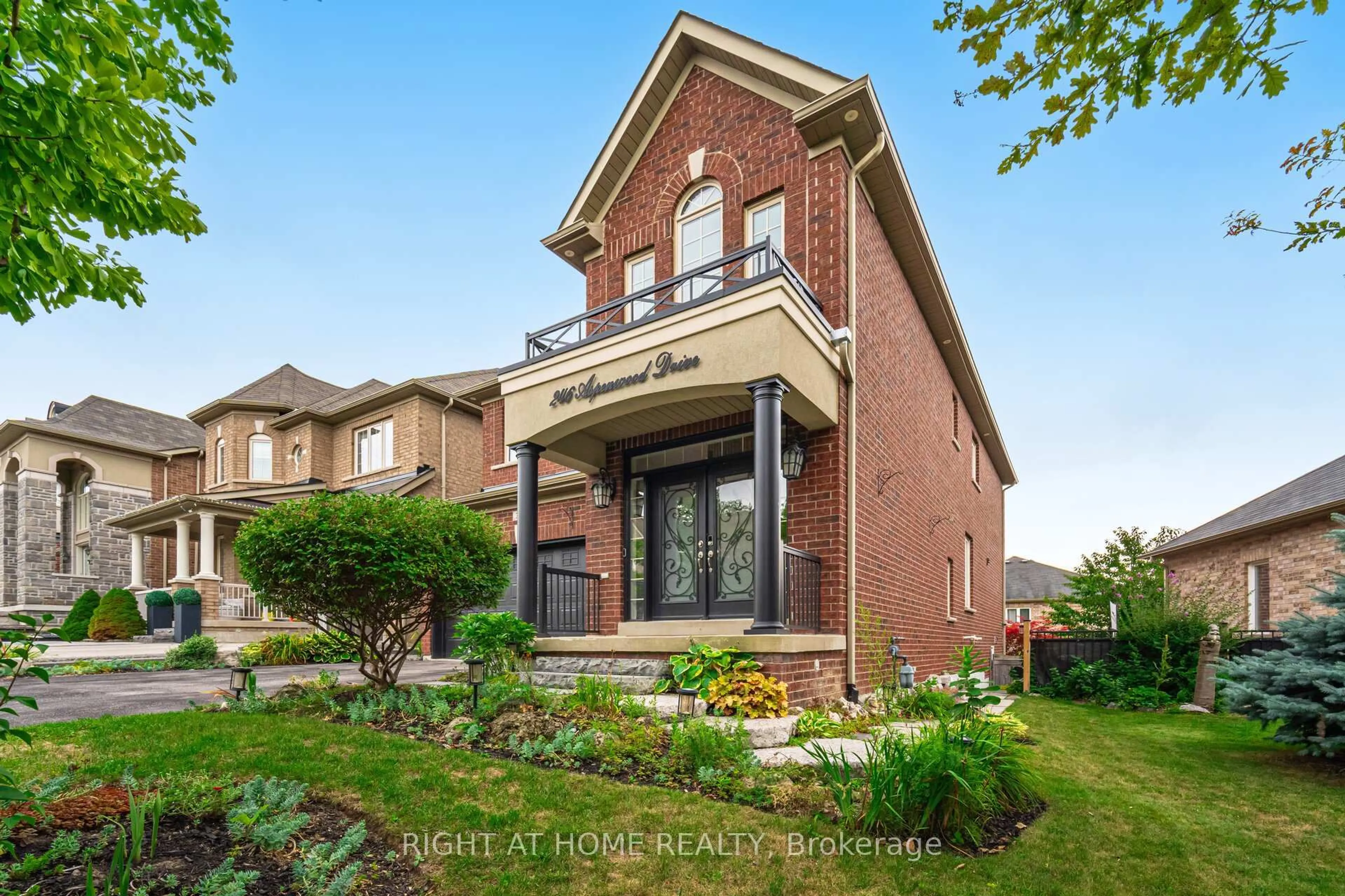 Home with brick exterior material, street for 246 Aspenwood Dr, Newmarket Ontario L3X 3K7