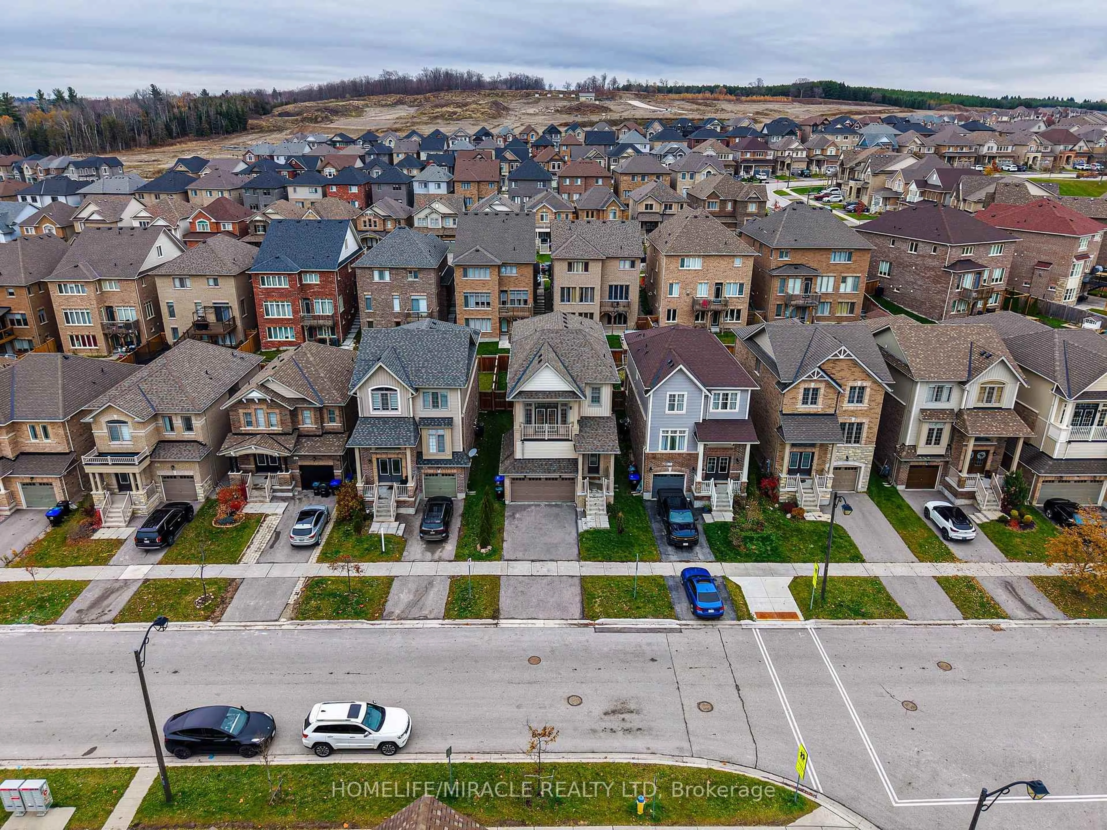 A pic from outside/outdoor area/front of a property/back of a property/a pic from drone, street for 79 Willoughby Way, New Tecumseth Ontario L9R 0P4