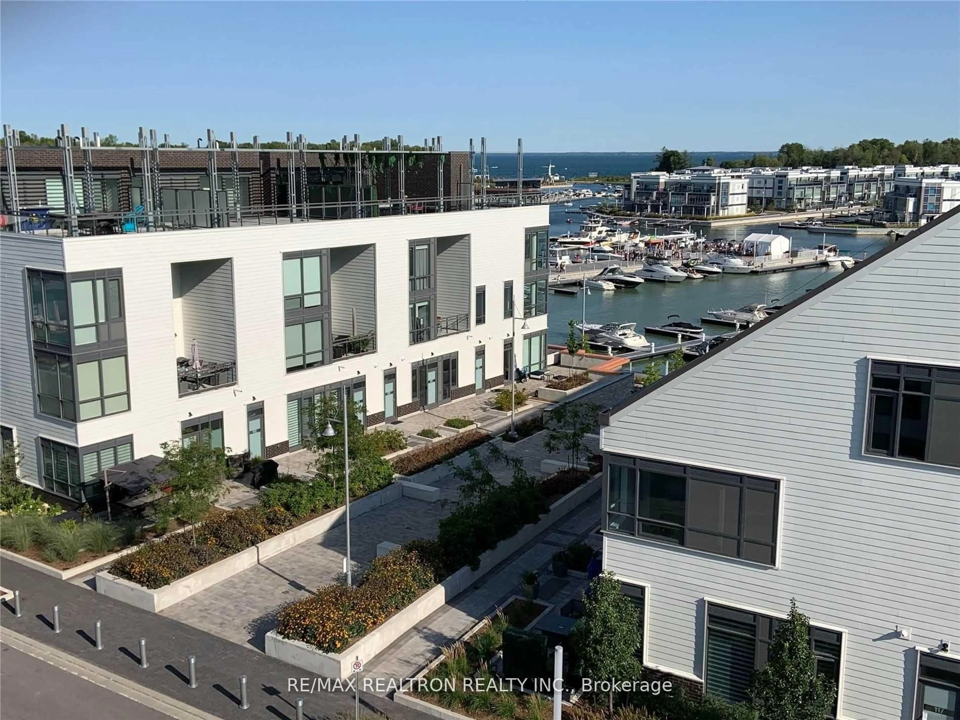 A pic from outside/outdoor area/front of a property/back of a property/a pic from drone, water/lake/river/ocean view for 333 Sea Ray Ave #D229, Innisfil Ontario L9S 0M3