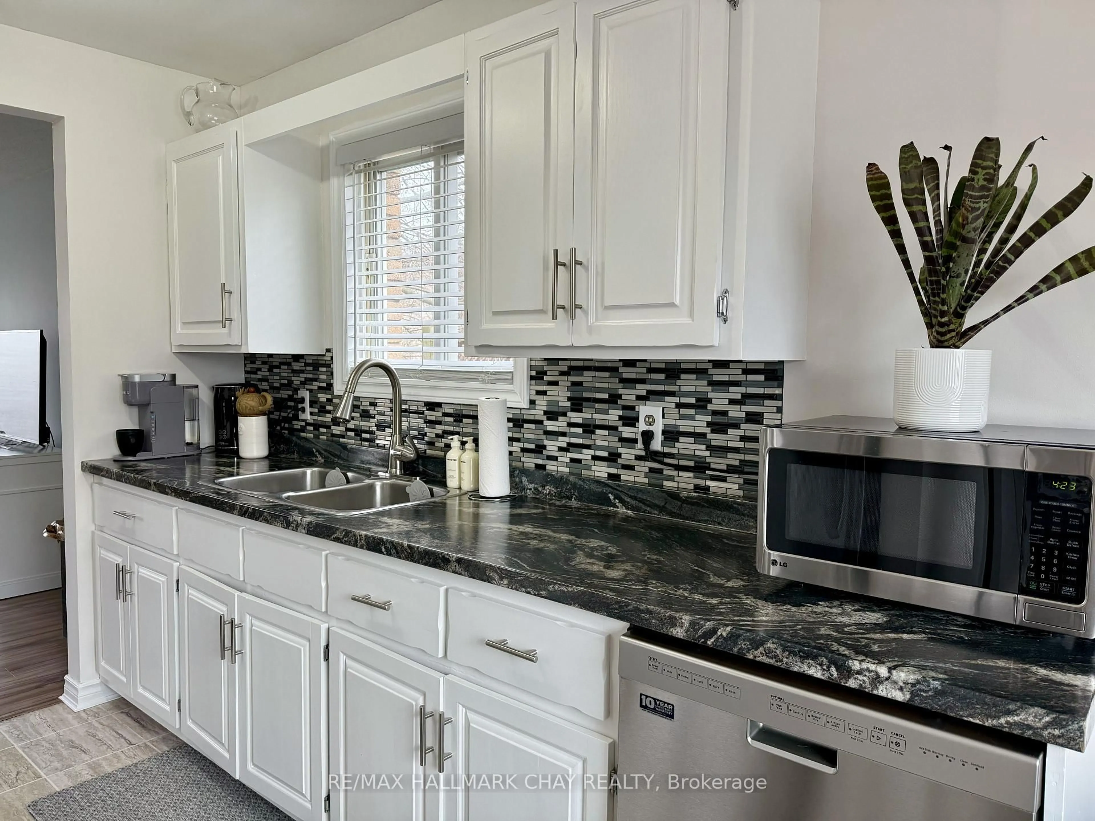 Contemporary kitchen, ceramic/tile floor for 60 Osborn St, Essa Ontario L0M 1B0