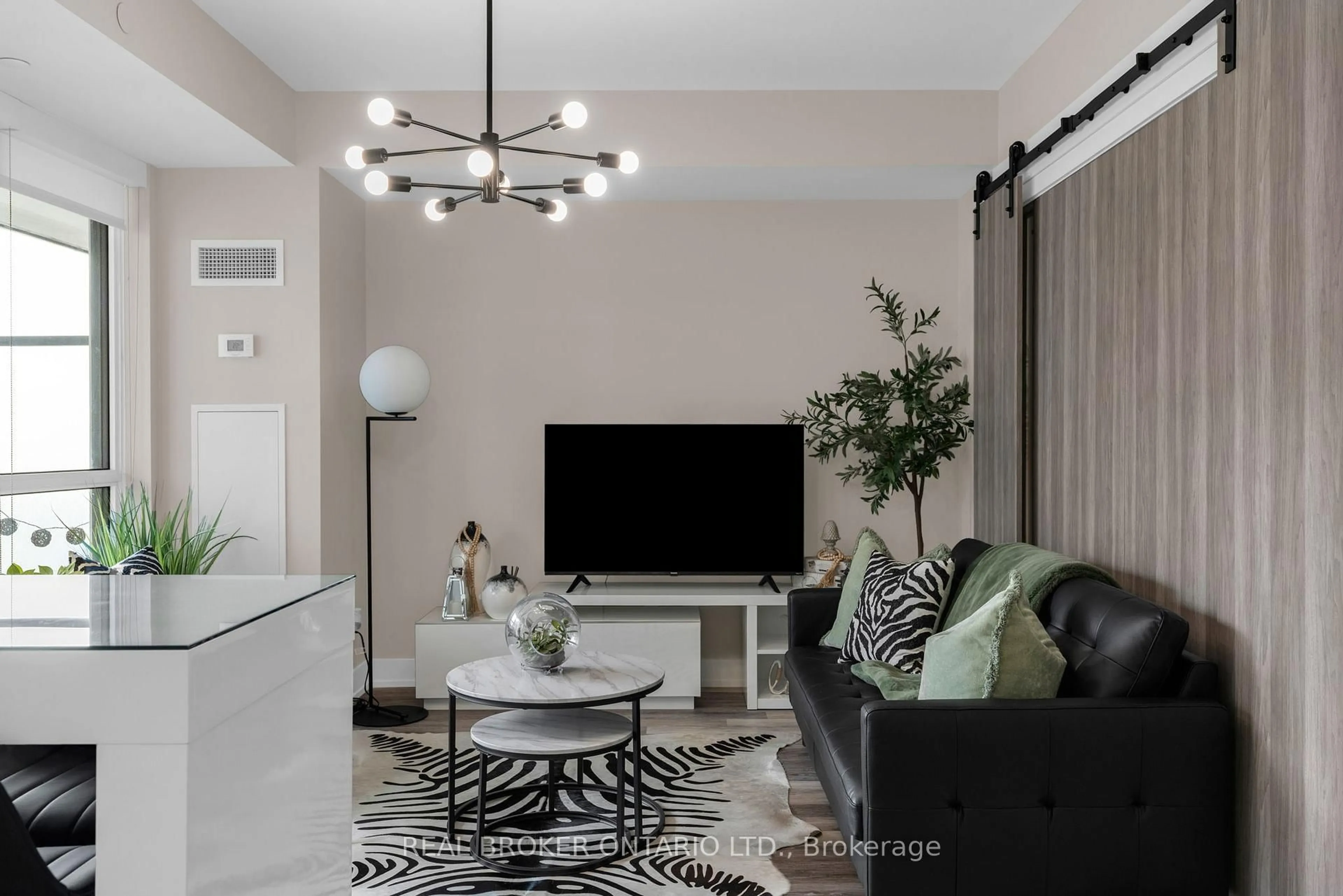 Living room with furniture, unknown for 241 Sea Ray Ave #A303, Innisfil Ontario L9S 2P7