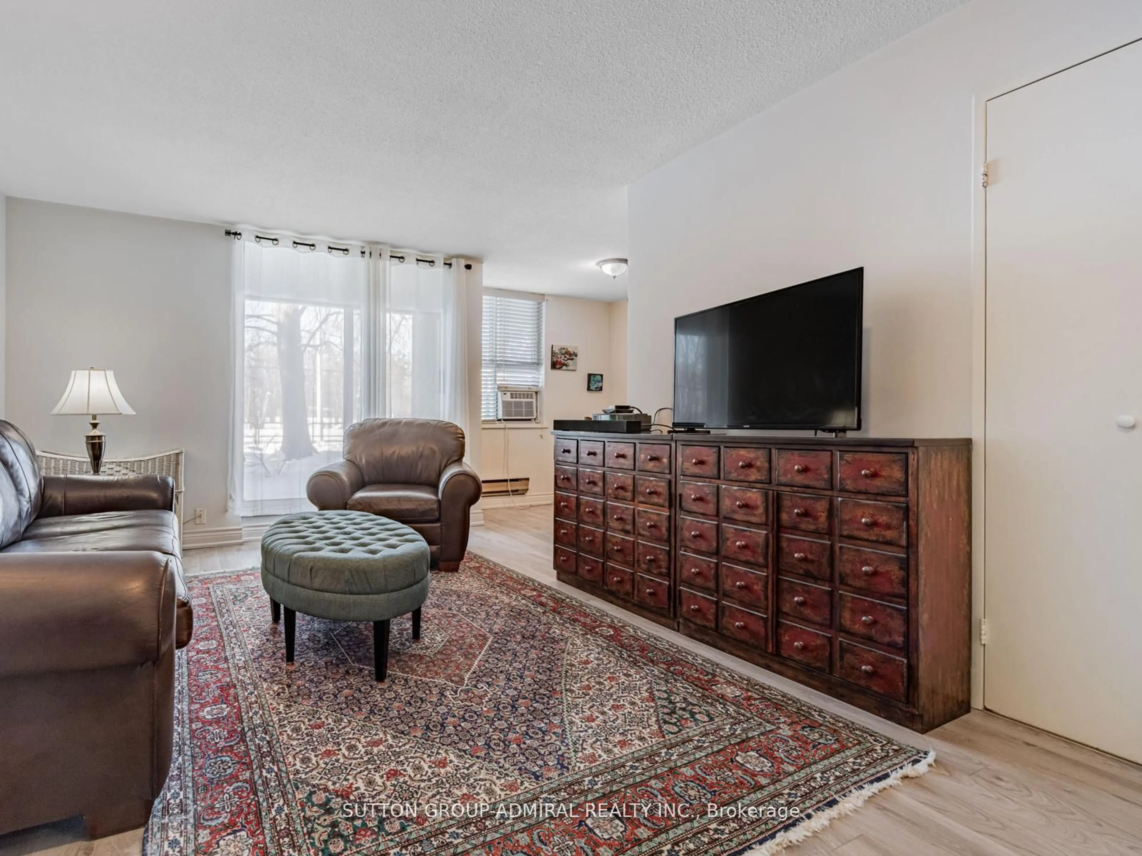 Living room with furniture, unknown for 80 Inverlochy Blvd #108, Markham Ontario L3T 4P3
