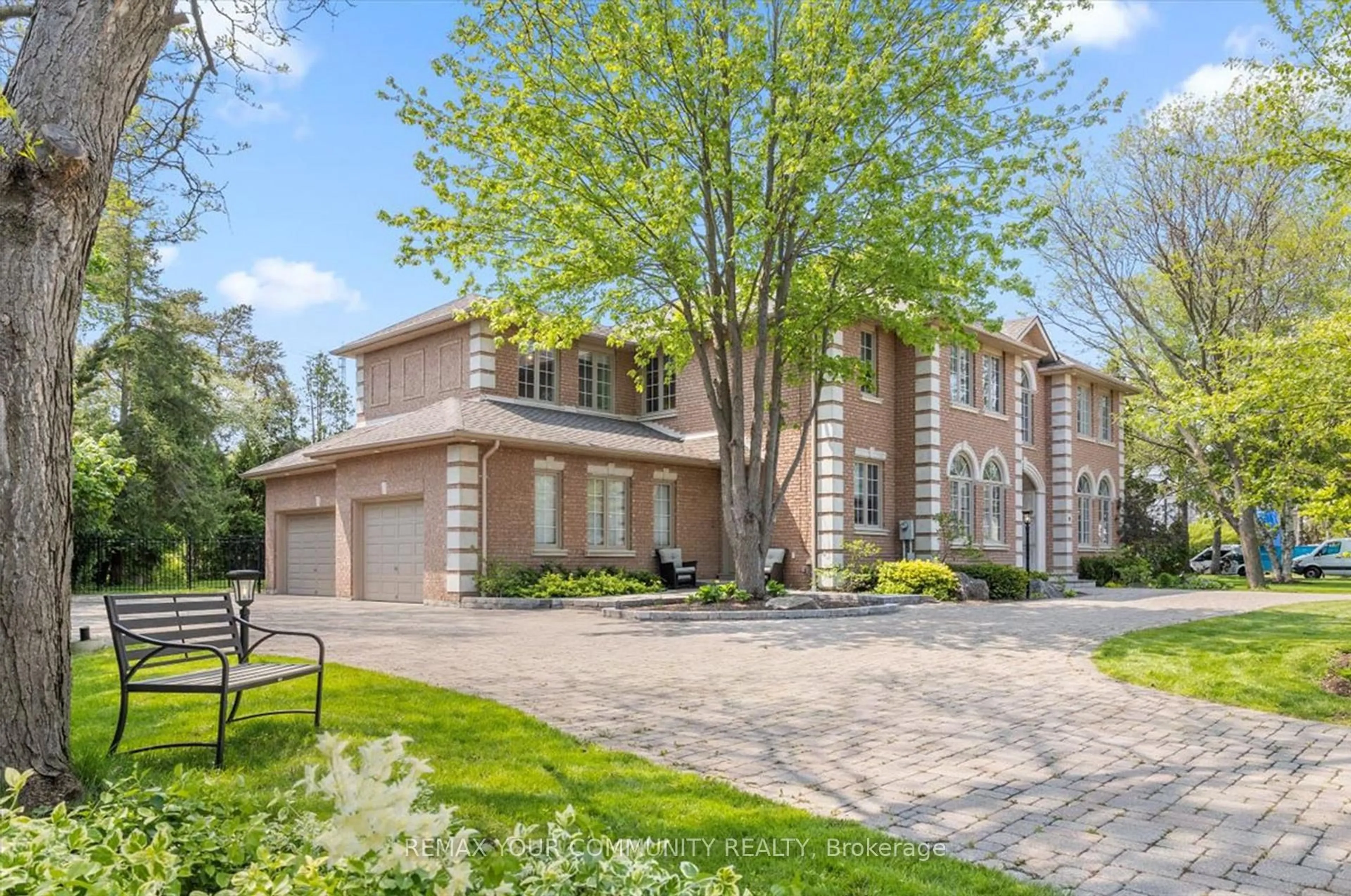 Home with brick exterior material, street for 22 Valloncliffe Rd, Markham Ontario L3T 2W8