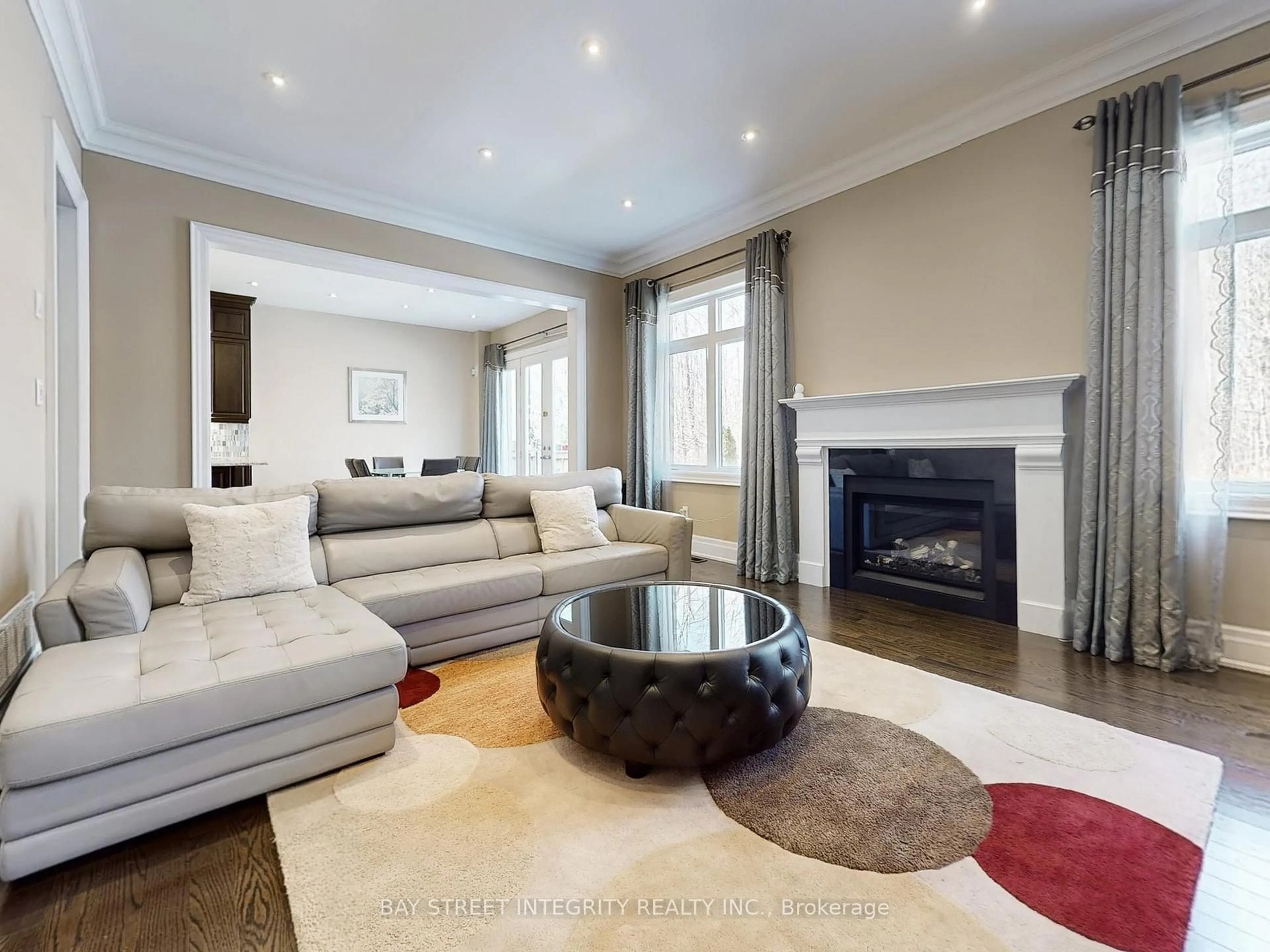 Living room with furniture, unknown for 57 Strawbridge Farm Dr, Aurora Ontario L4G 0L2