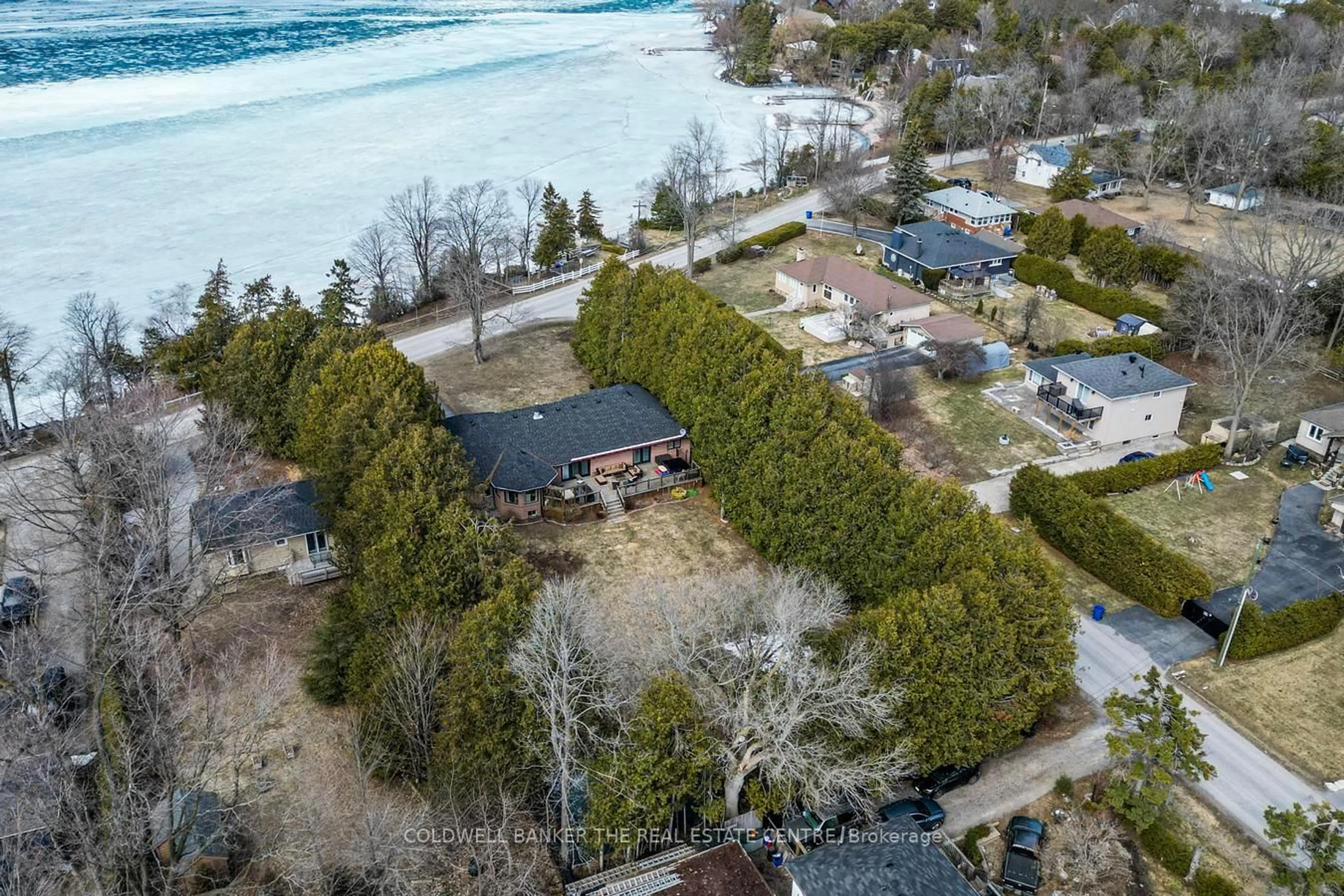 A pic from outside/outdoor area/front of a property/back of a property/a pic from drone, water/lake/river/ocean view for 567 Lake Dr, Georgina Ontario L0E 1S0