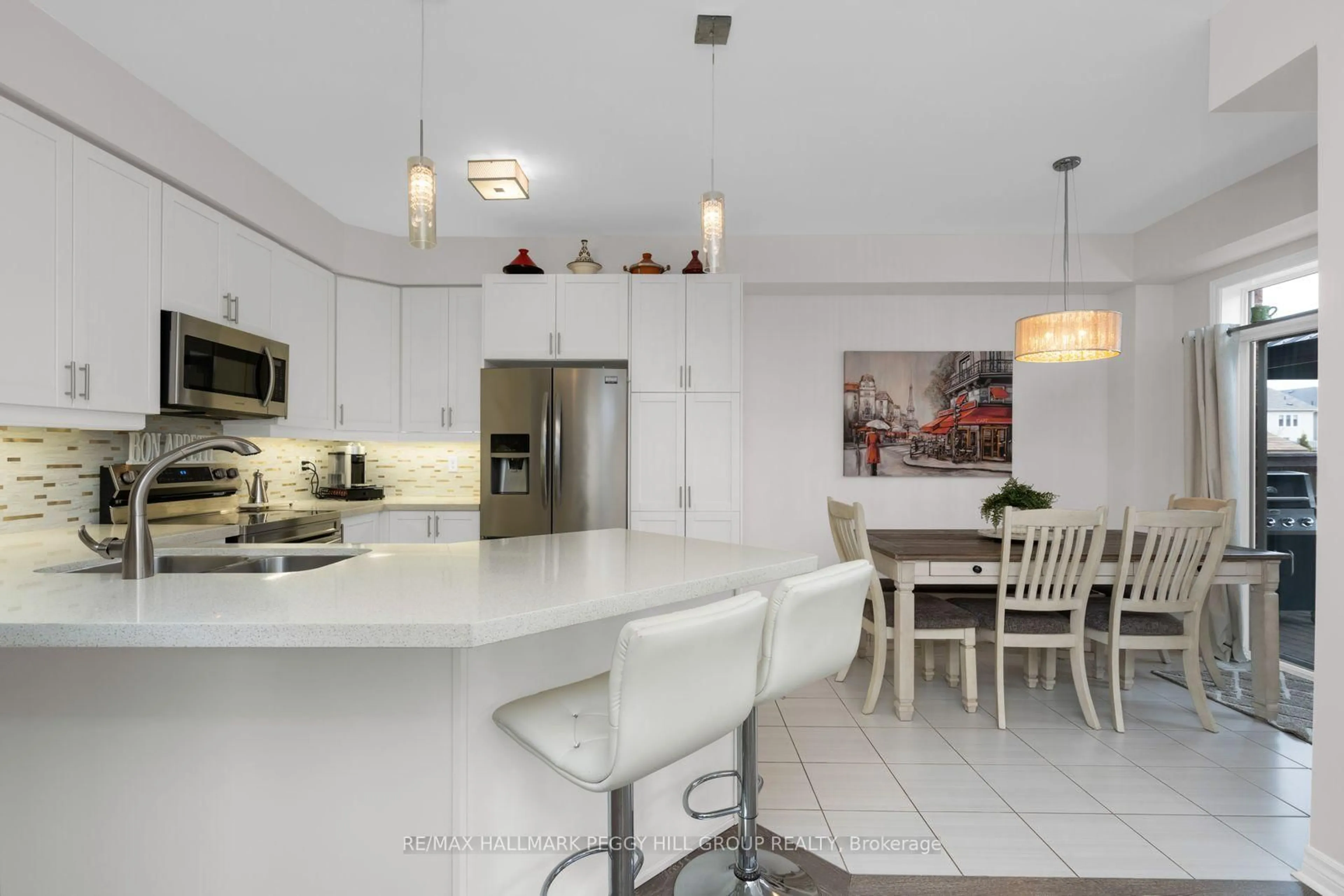 Open concept kitchen, ceramic/tile floor for 138 Mount Cres, Essa Ontario L3W 0N1