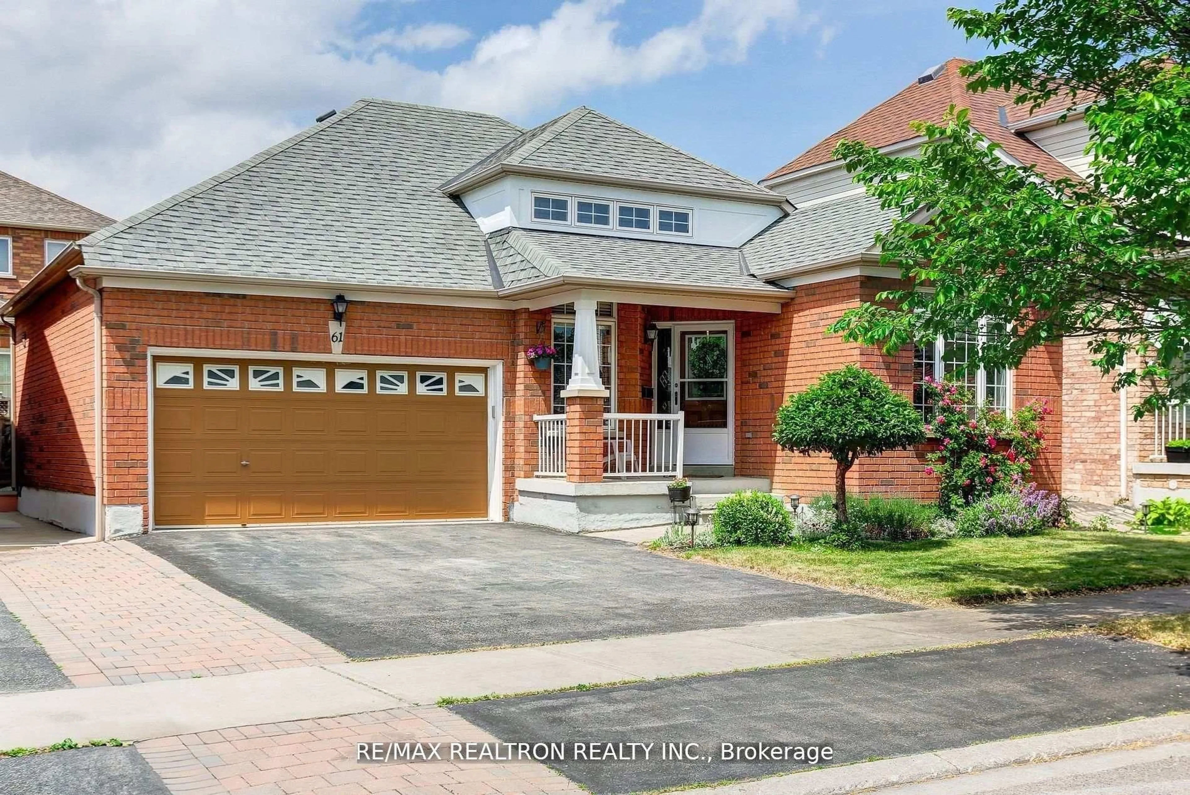 Home with brick exterior material, street for 61 Manorwood Dr, Markham Ontario L6C 2S2