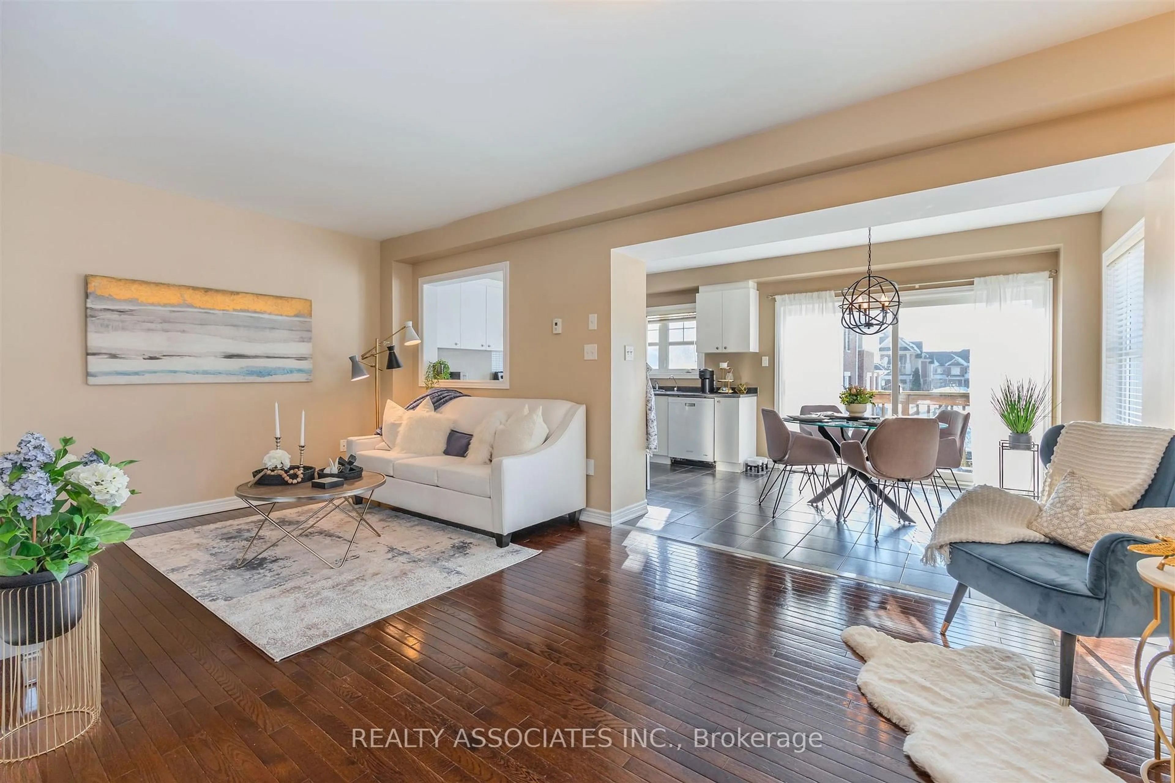 Living room with furniture, wood/laminate floor for 19 Bearings Ave, Whitchurch-Stouffville Ontario L4A 0W6